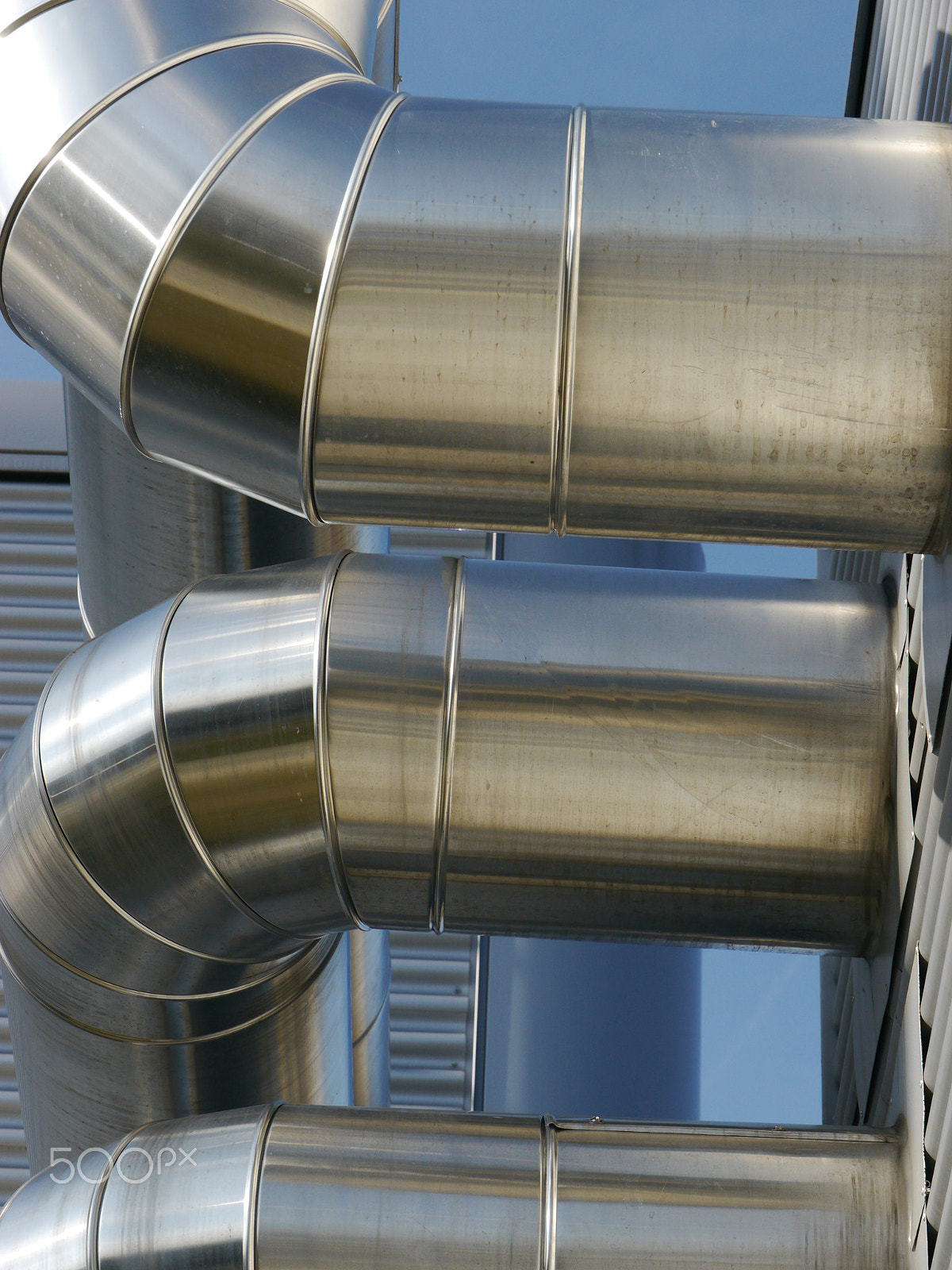 Panasonic Lumix DMC-GH2 sample photo. Lot of grey steel pipes photography