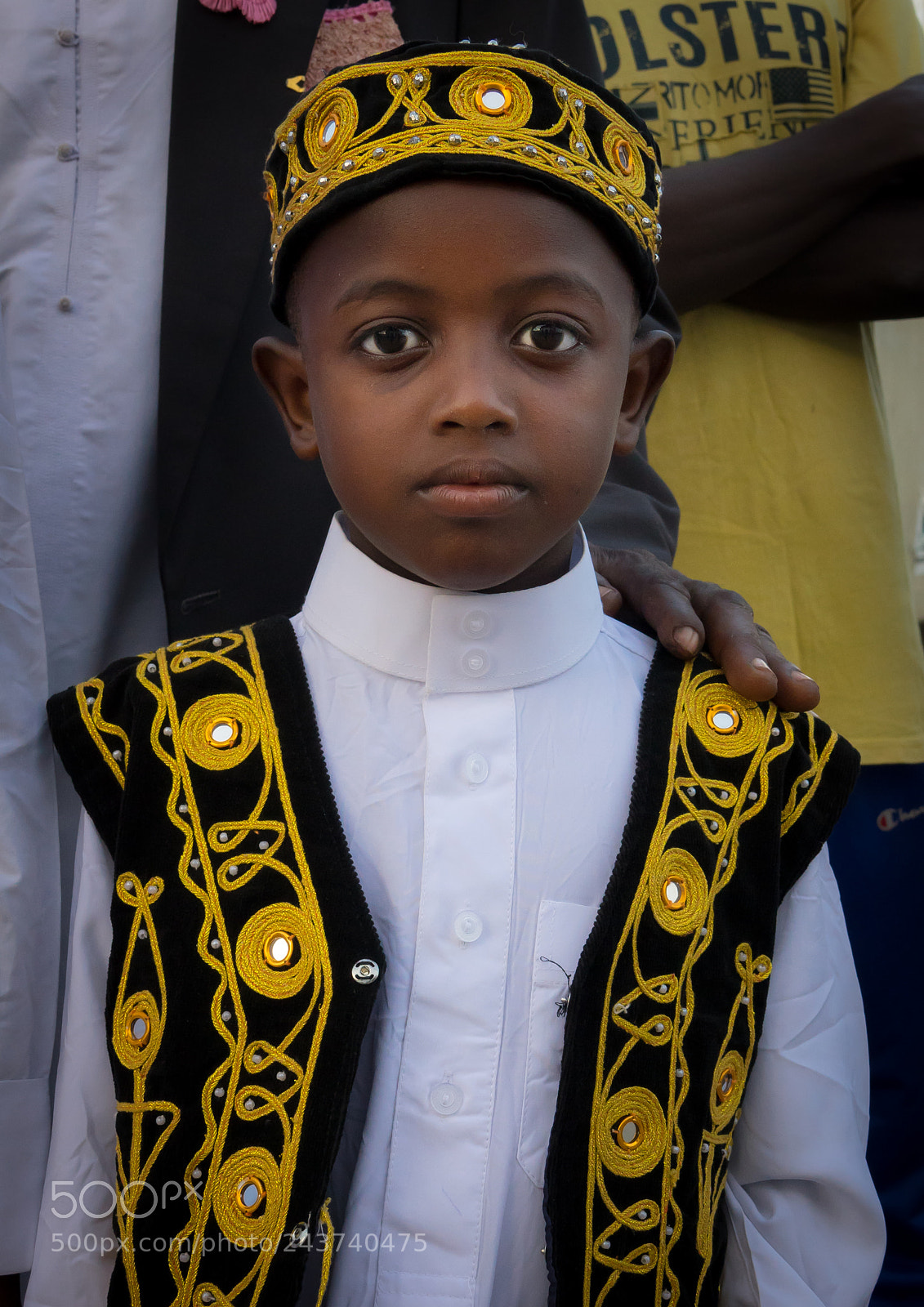 Sony Cyber-shot DSC-RX10 III sample photo. Kid wearing traditional suit photography
