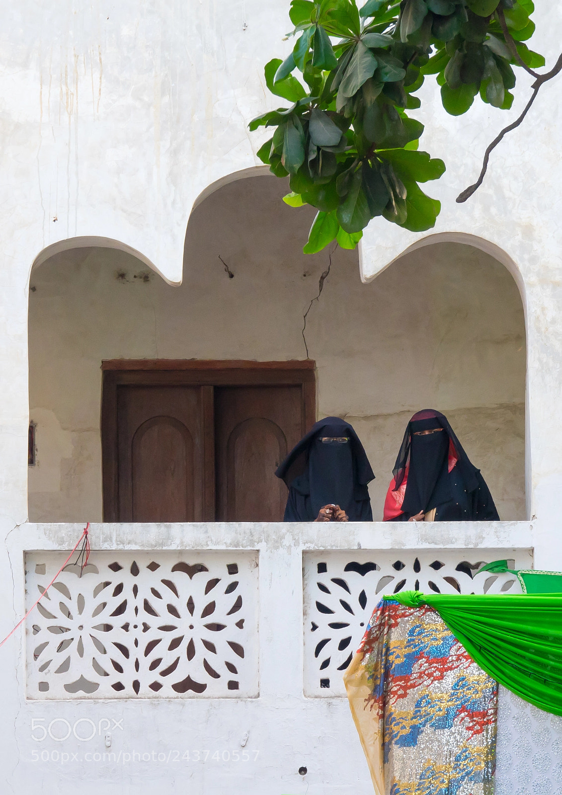 Sony Cyber-shot DSC-RX10 III sample photo. Women with burqa attending photography