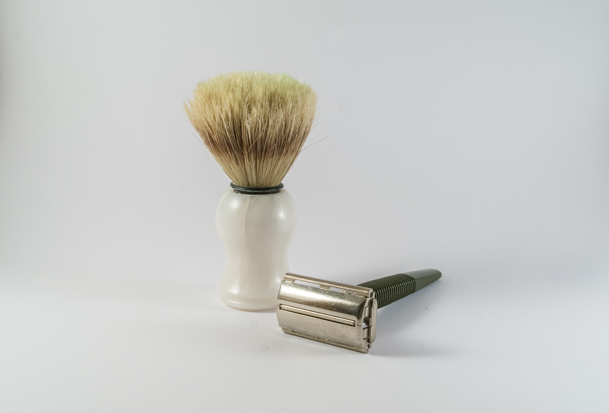 Samsung NX100 sample photo. Retro shaving brush and razor photography