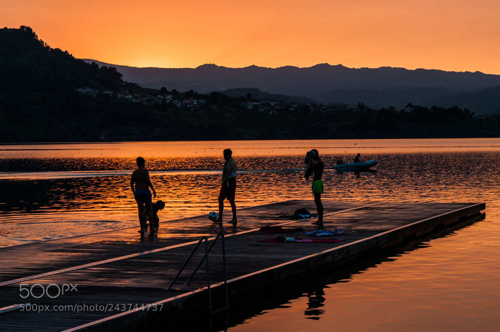 Pentax K20D sample photo. Football at sunset in photography