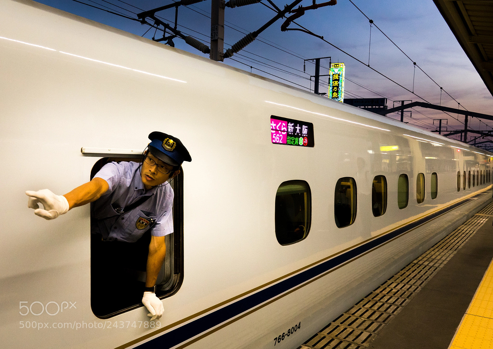 Sony Cyber-shot DSC-RX10 III sample photo. Train conductor by the photography