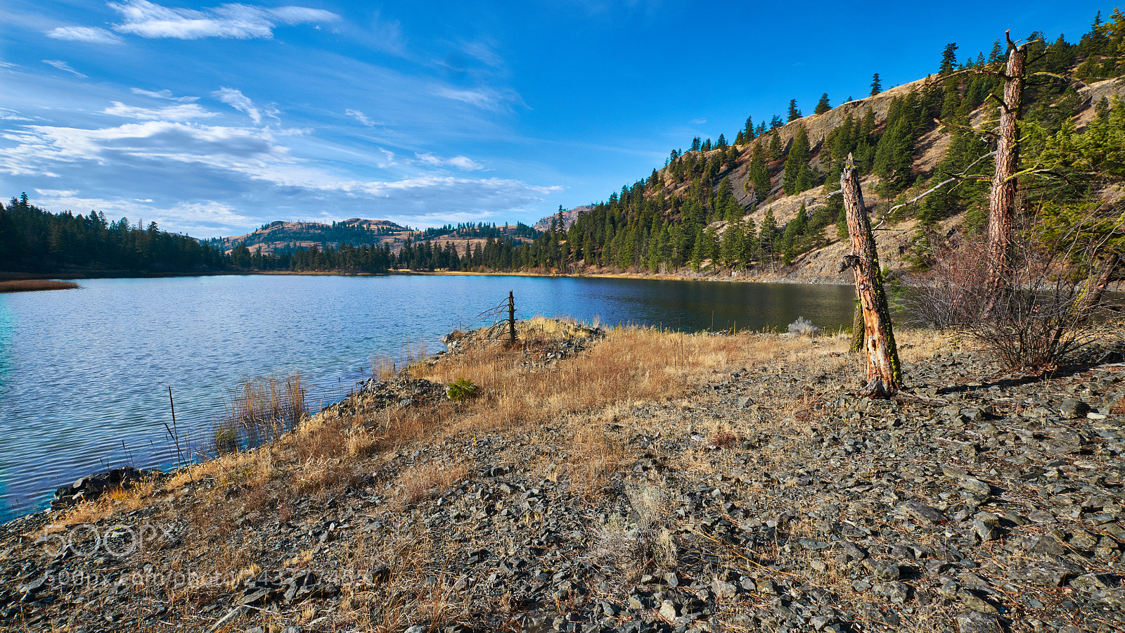 Nikon D850 sample photo. Blue lake rocky spit photography