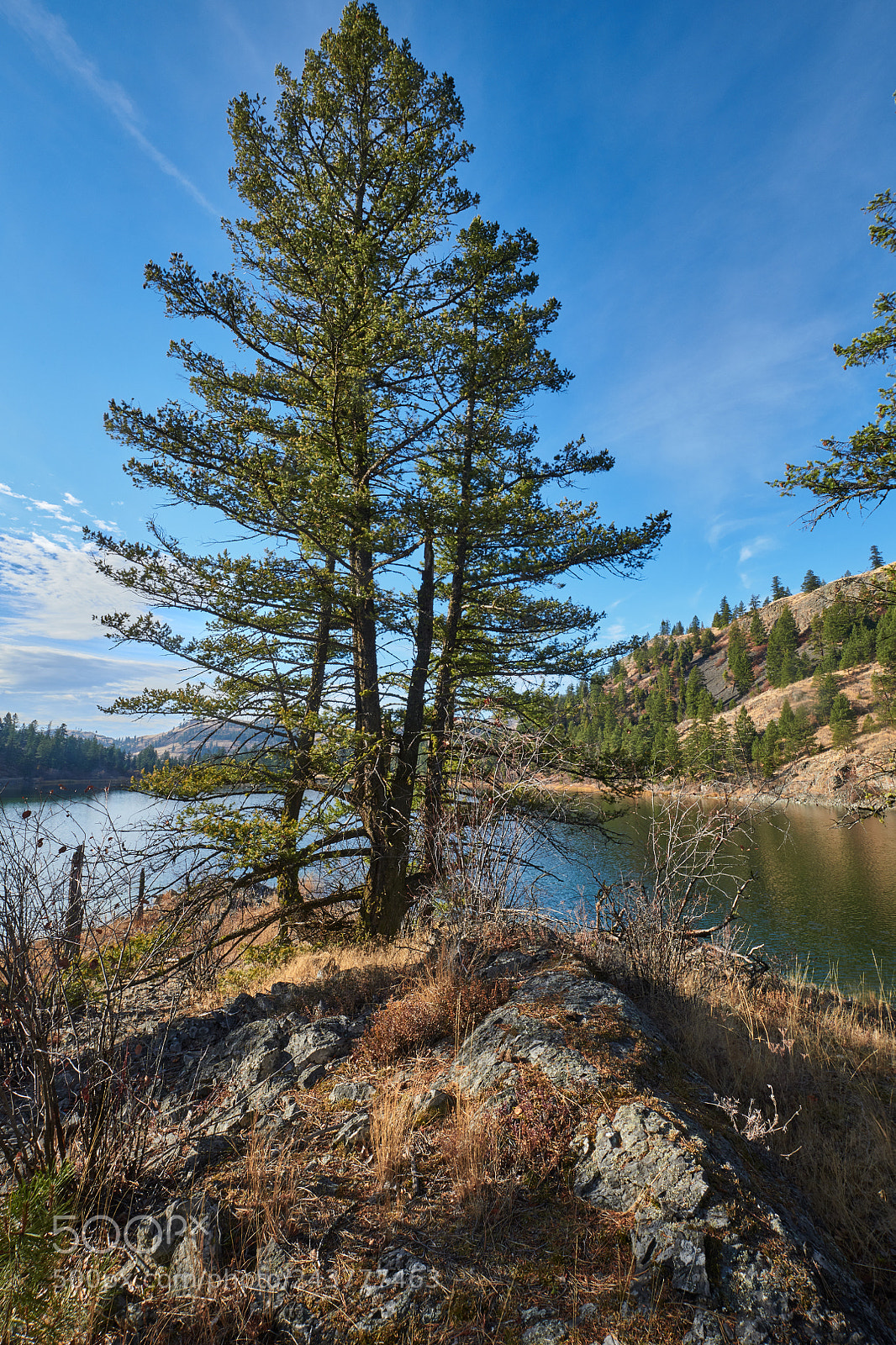 Nikon D850 sample photo. Blue lake rocky spit photography