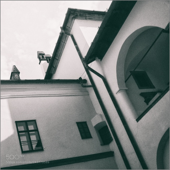 Olympus SP570UZ sample photo. The roofs photography