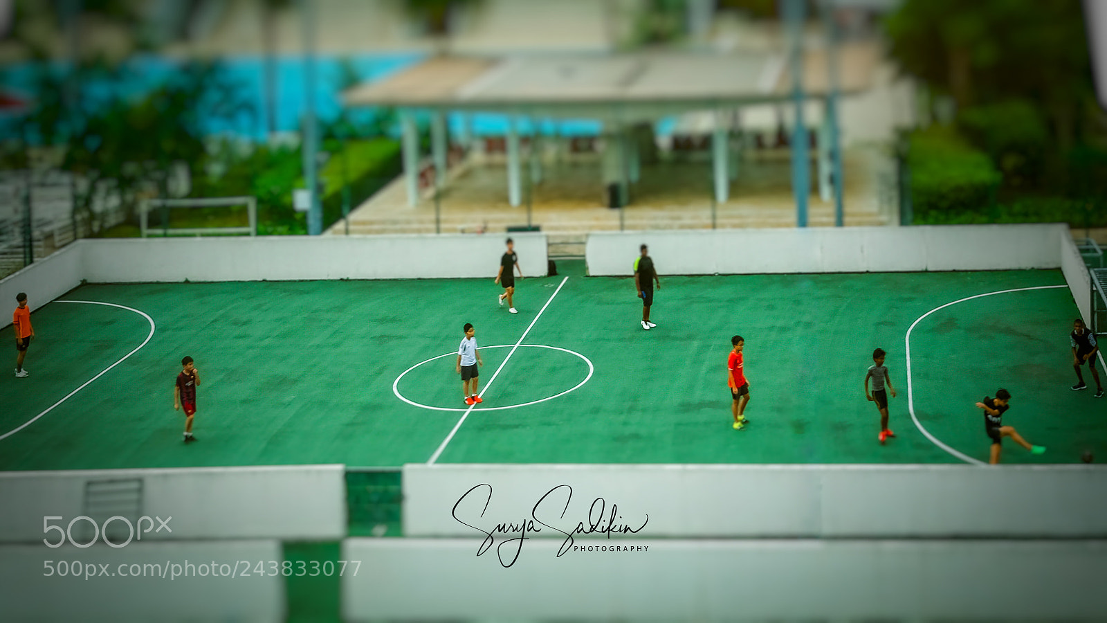 Fujifilm X70 sample photo. Soccer player toys photography