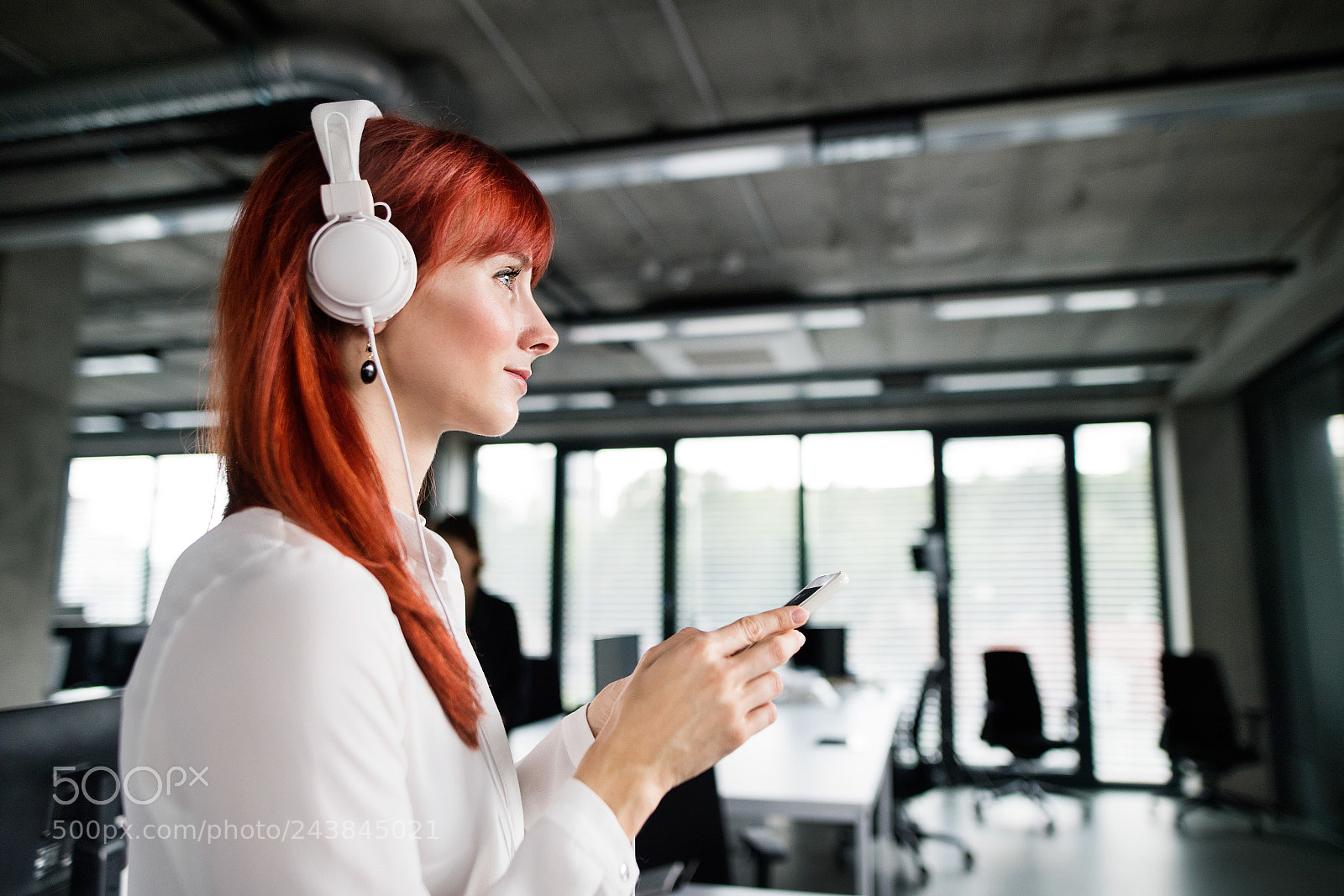 Nikon D5 sample photo. Businesswoman with earphones and photography