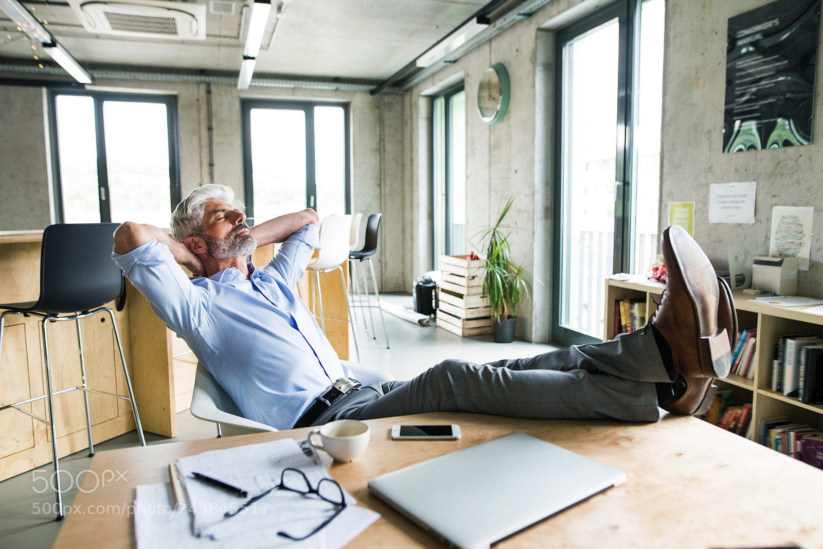 Nikon D5 sample photo. Thoughtful mature businessman with photography