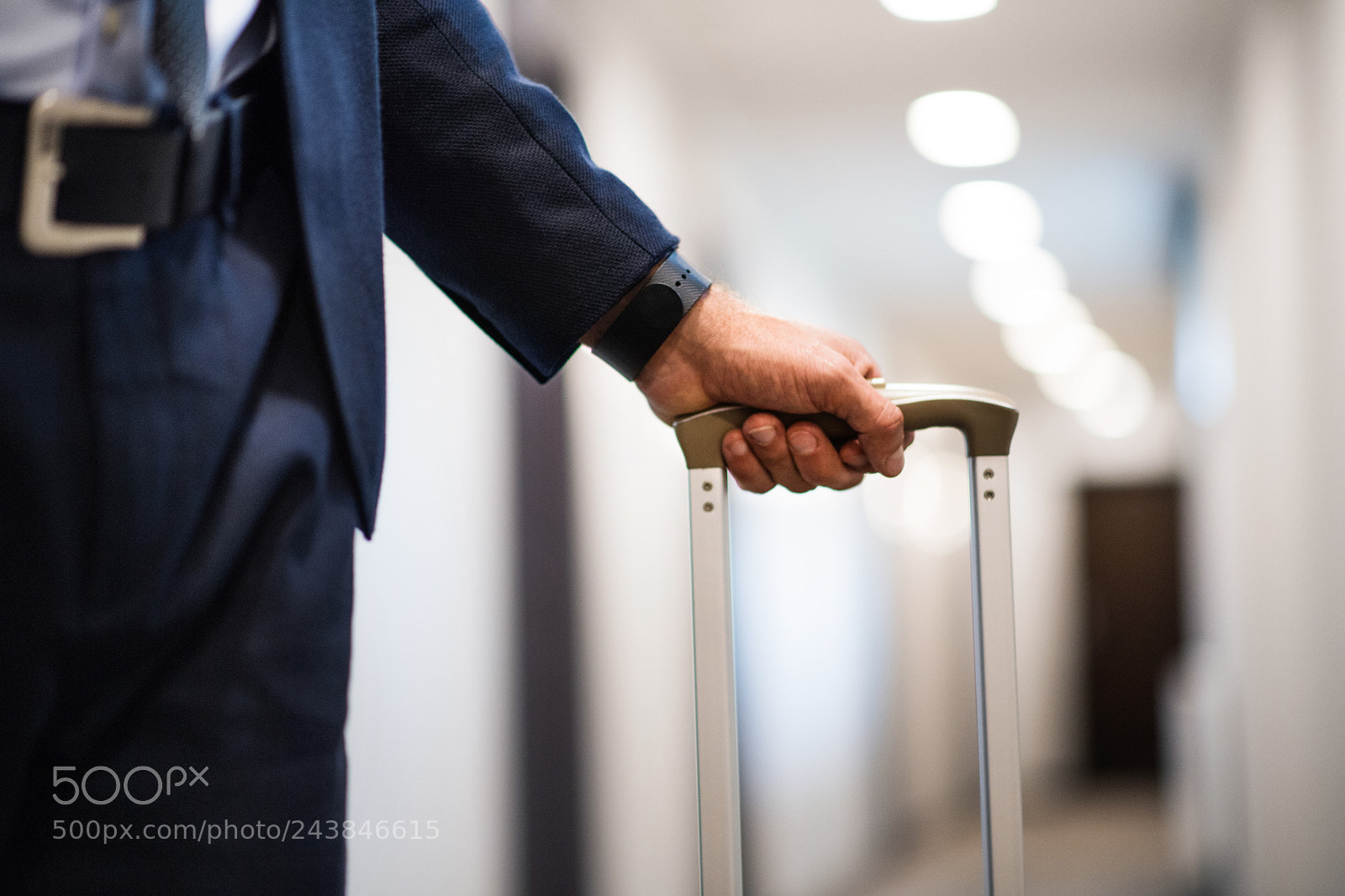 Nikon D5 sample photo. Unrecognizable businessman with luggage photography