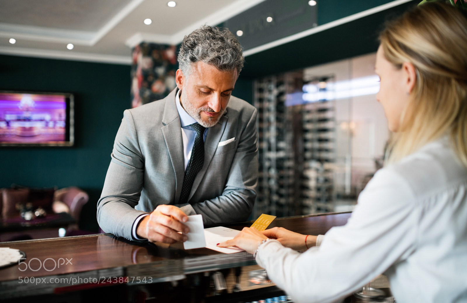 Nikon D5 sample photo. Mature businessman at hotel photography