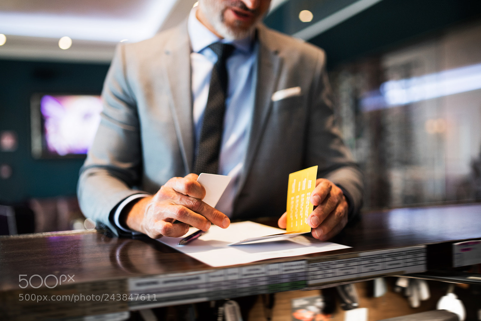 Nikon D5 sample photo. Mature businessman at hotel photography