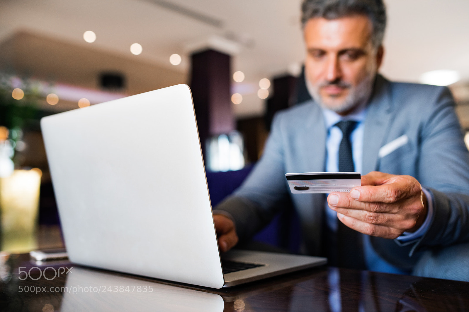 Nikon D5 sample photo. Mature businessman with laptop photography