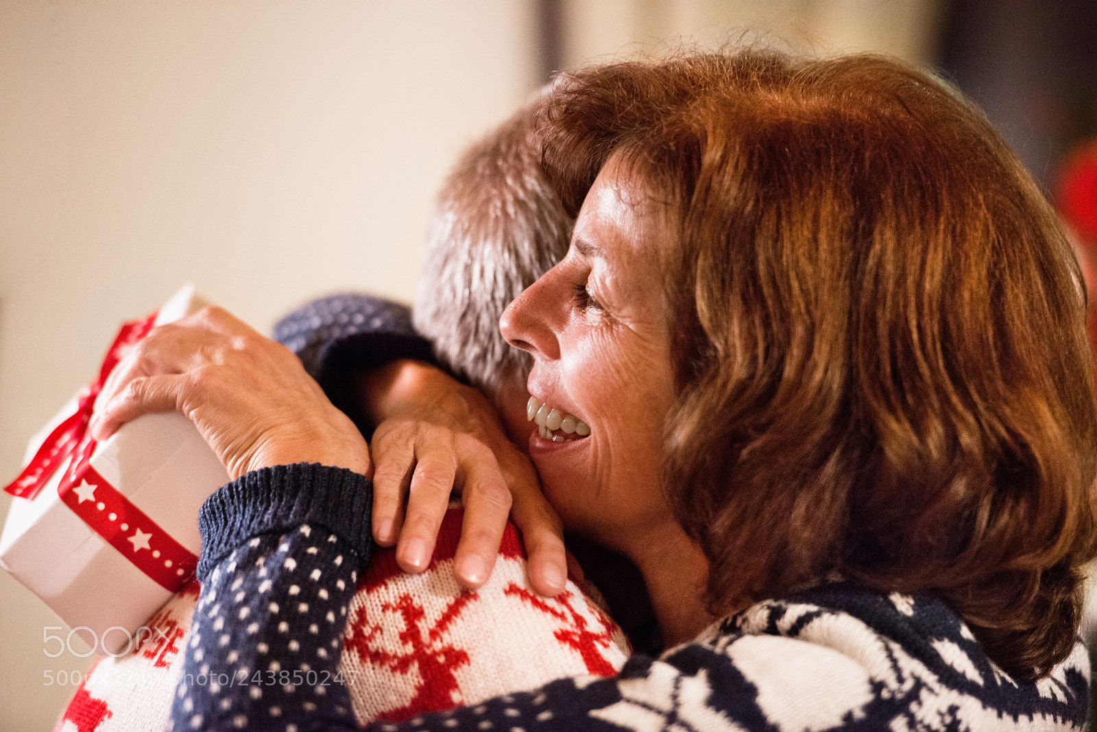 Nikon D800 sample photo. Senior couple exchanging presents photography