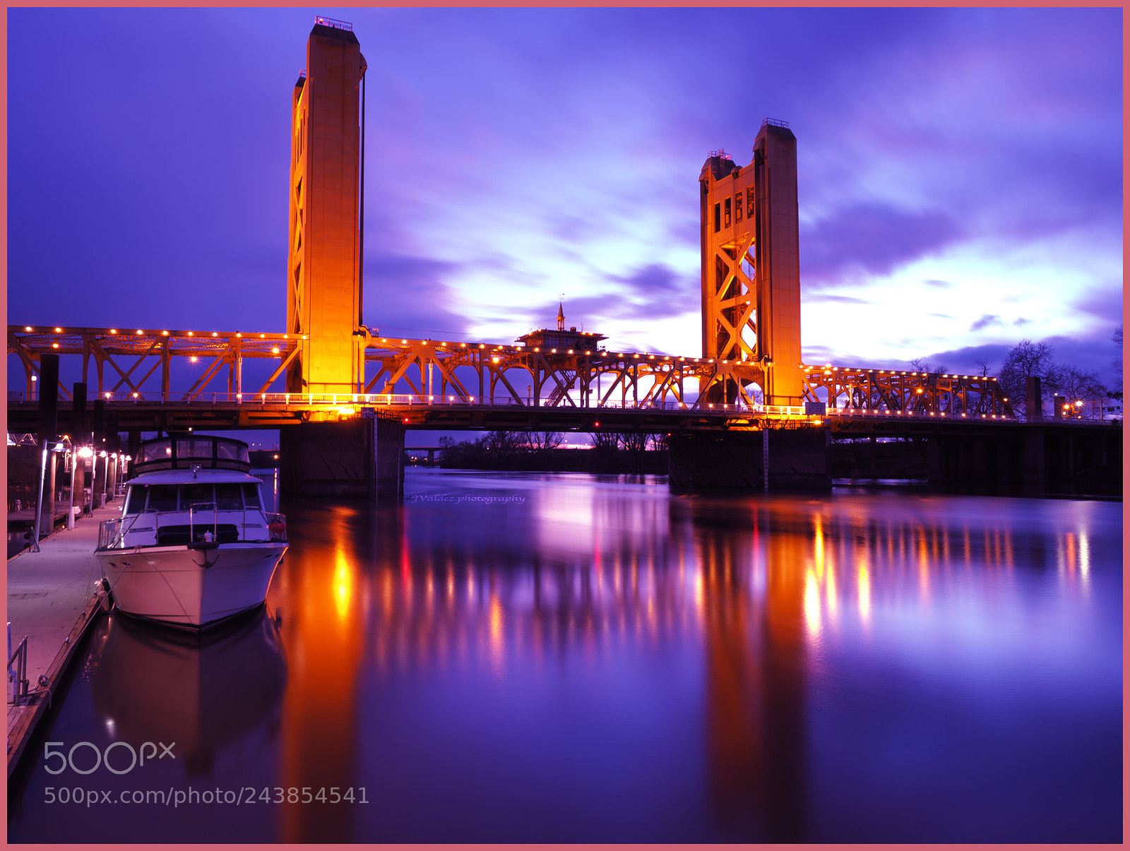 Olympus OM-D E-M1 Mark II sample photo. Purple colors around tower photography