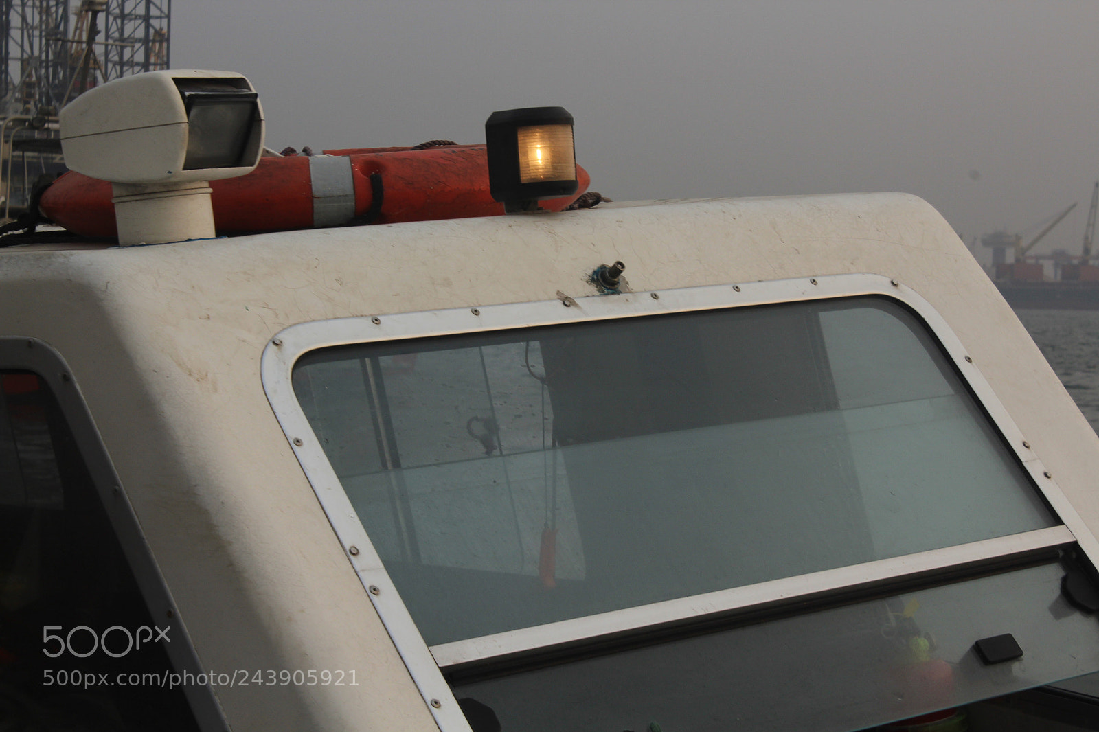 Canon EF-S 18-55mm F3.5-5.6 III sample photo. Lighted speedboat photography