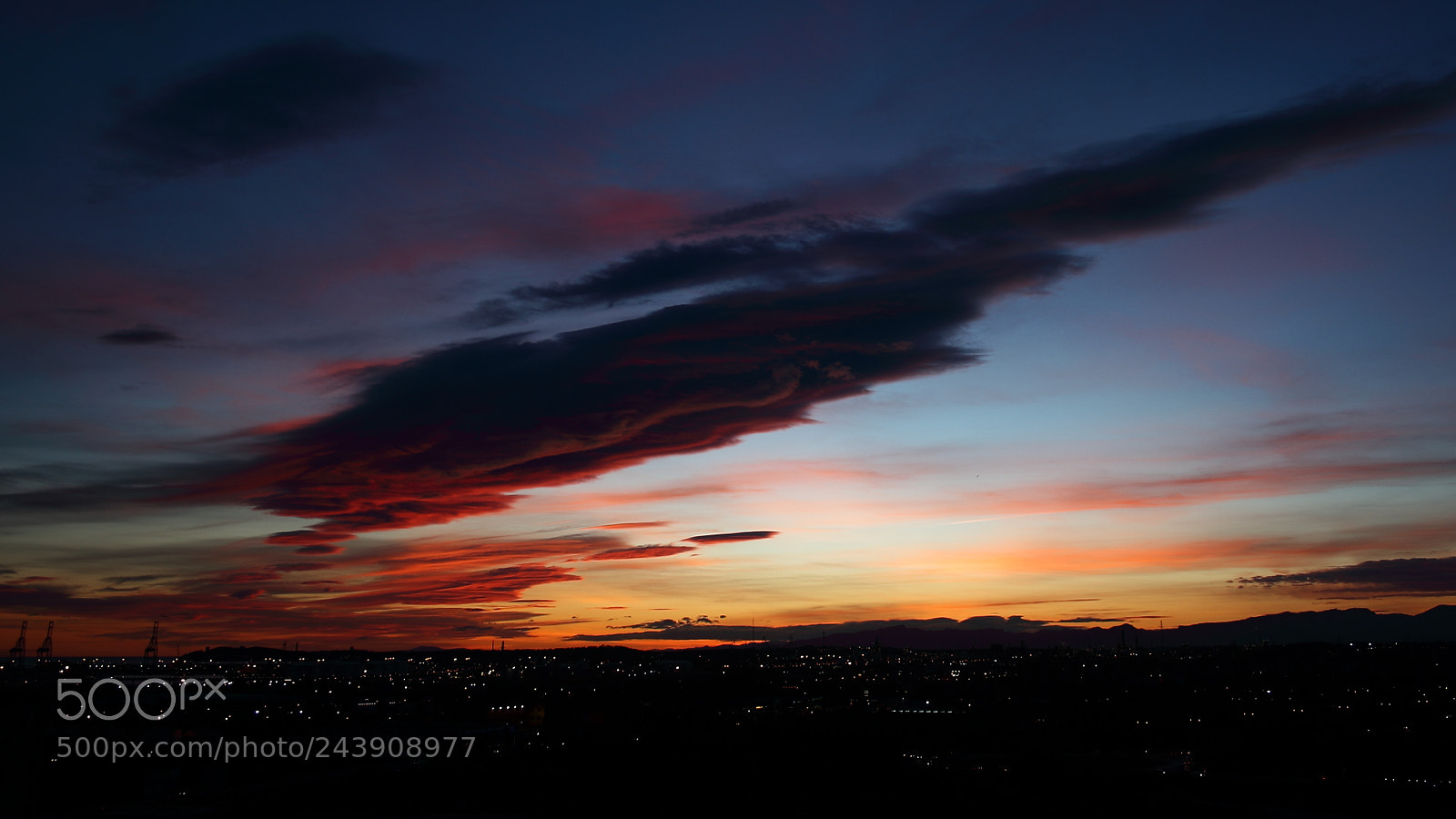 Canon EF-S 18-55mm F3.5-5.6 II sample photo. Stretching across the sky photography