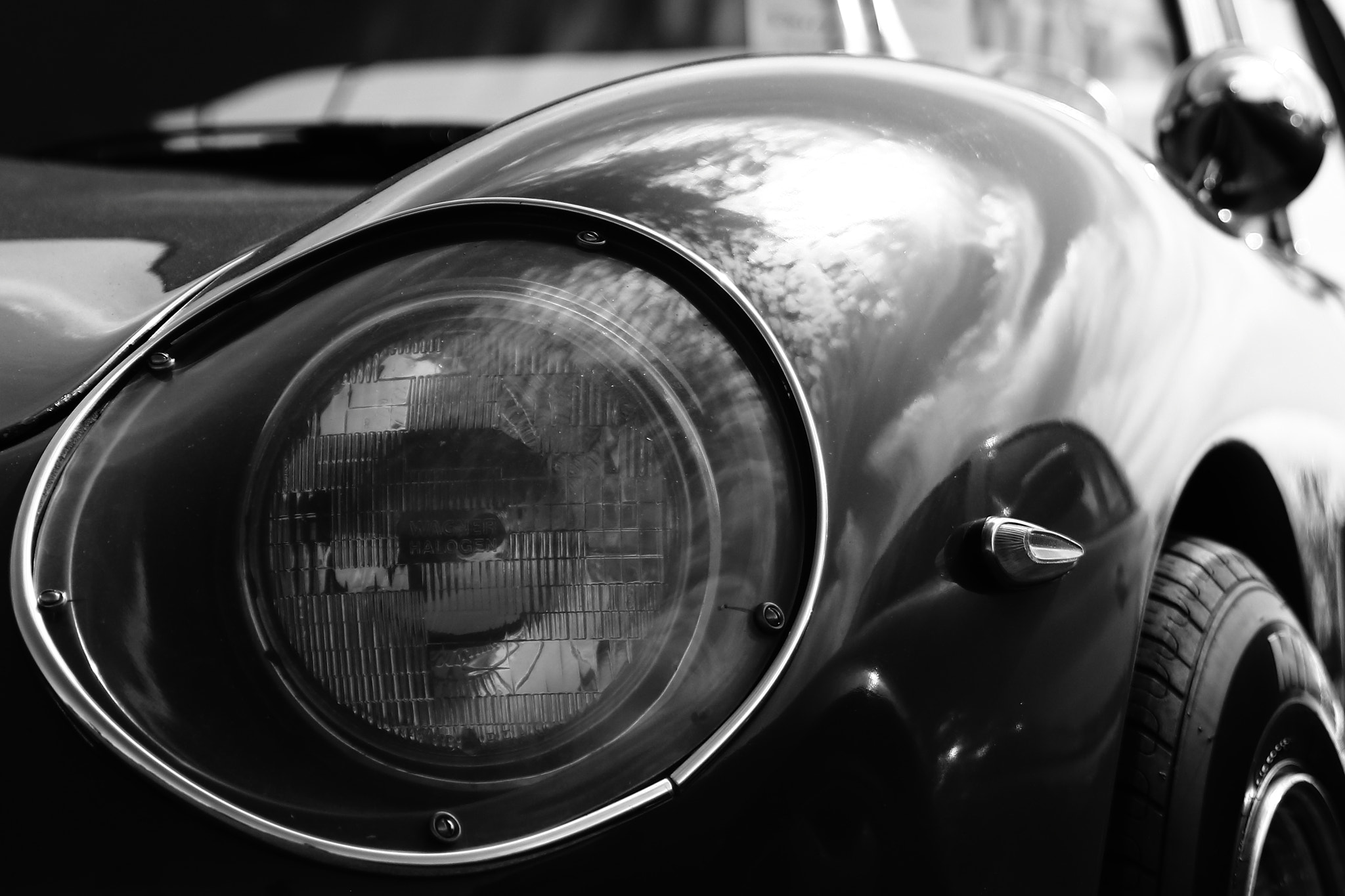 Canon EF 70-300mm F4-5.6 IS USM sample photo. Ferrari in b&w photography