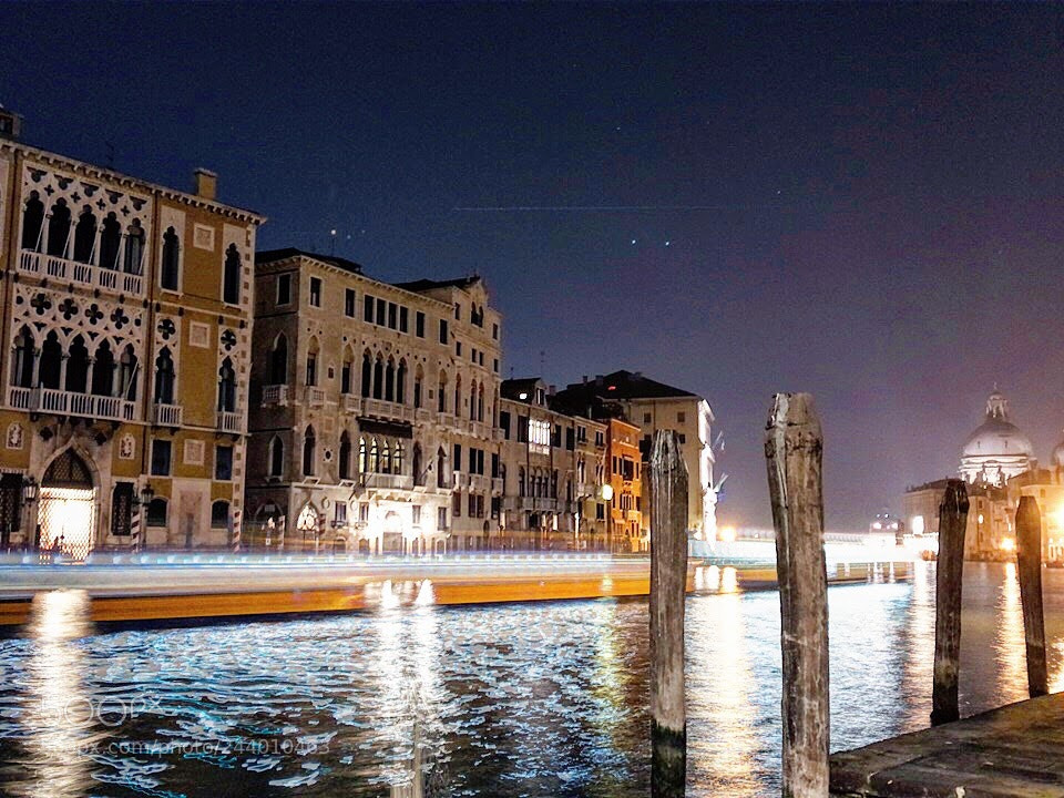 Apple iPhone sample photo. Boat's light trails photography
