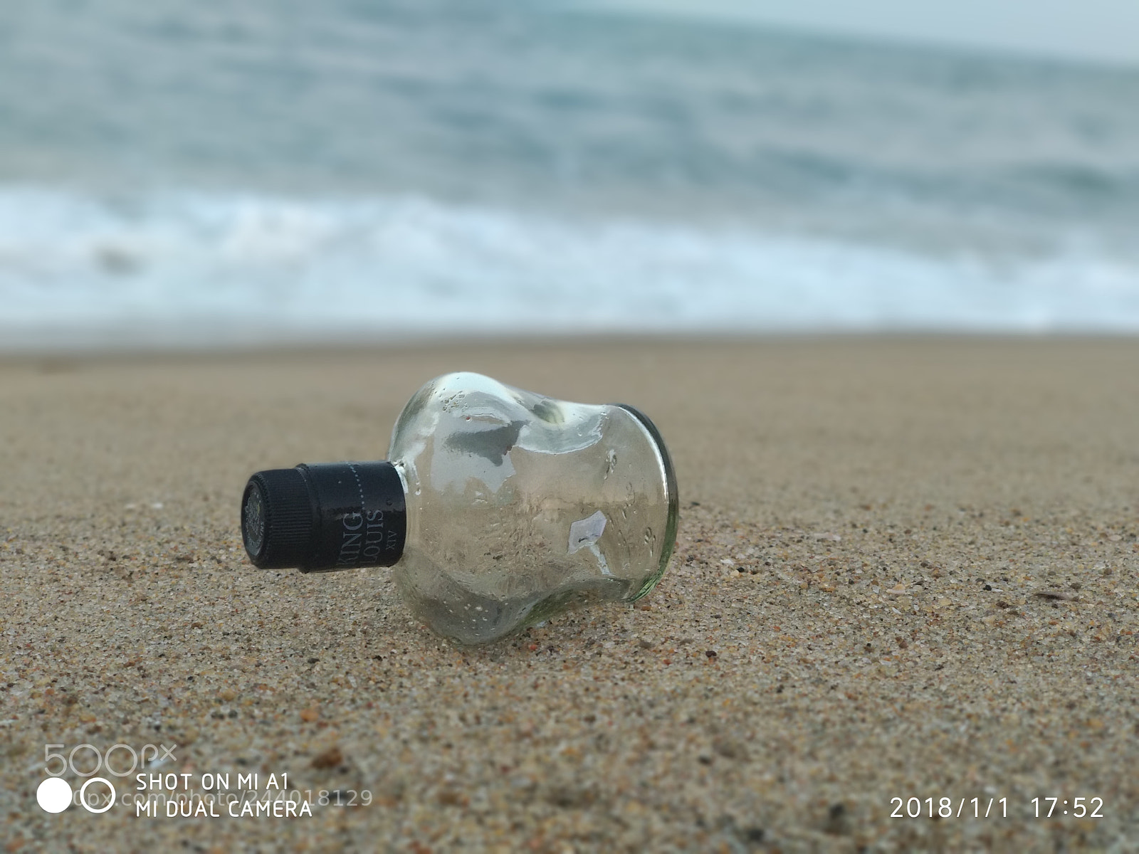 Xiaomi Mi A1 sample photo. Bottle on the beach photography