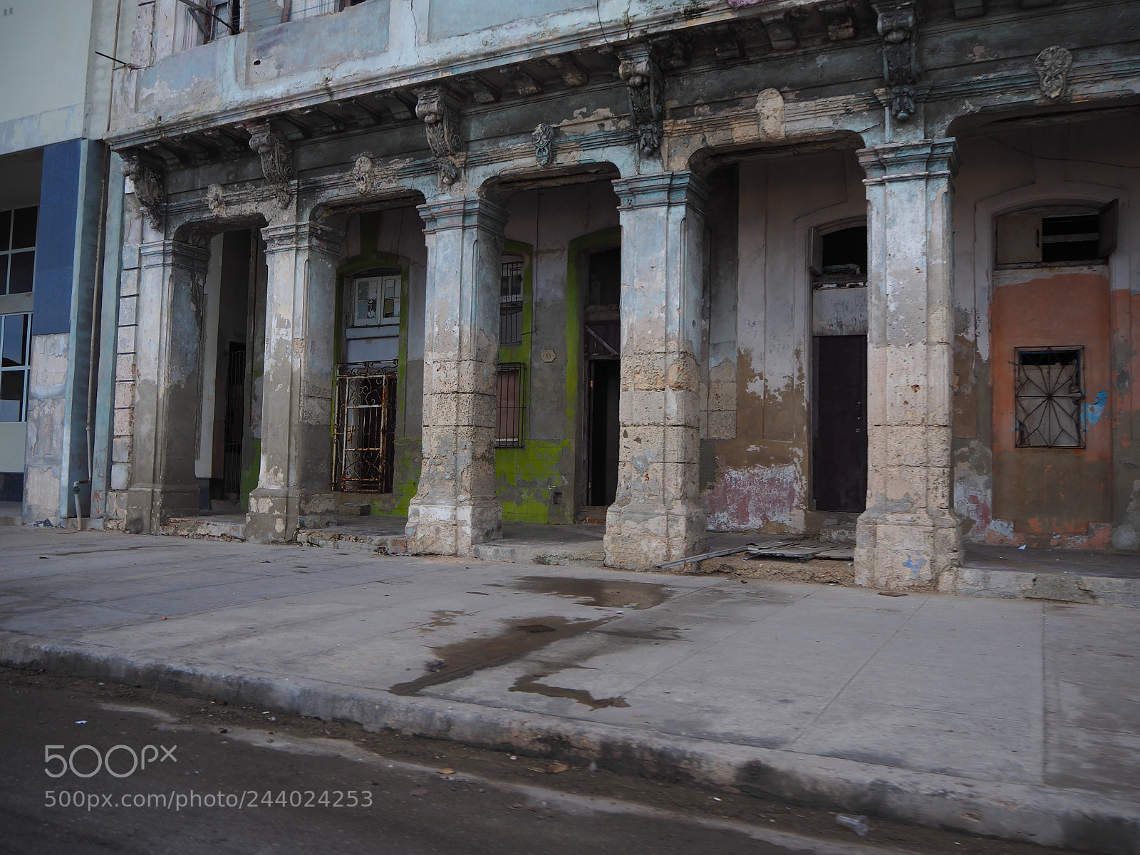 Olympus OM-D E-M10 II sample photo. A city in ruins photography