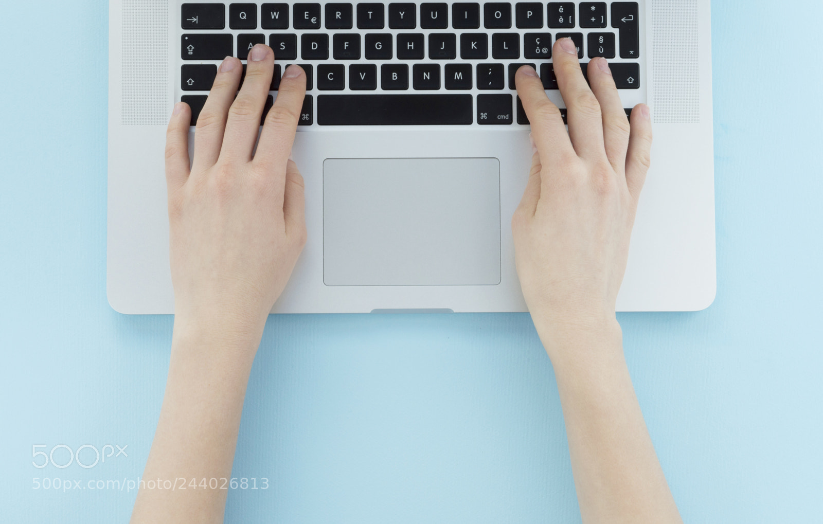 Nikon D3200 sample photo. Hands typing on silver photography