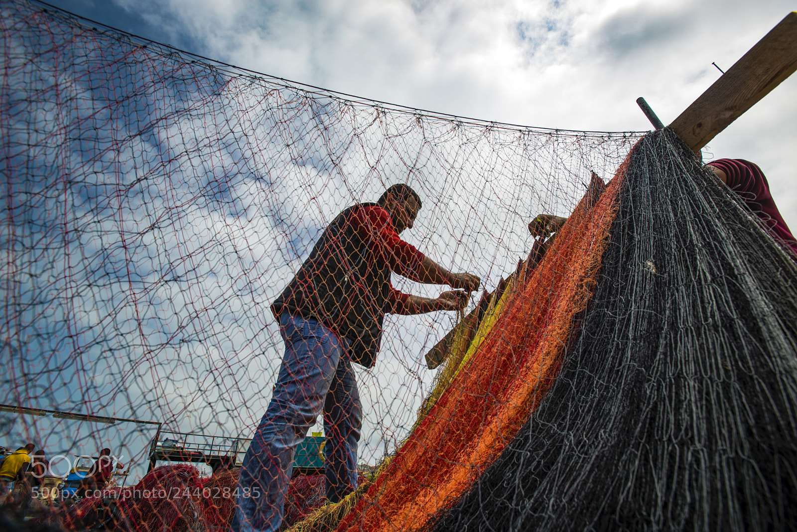 Nikon D800E sample photo. Fishermen that is repairing photography