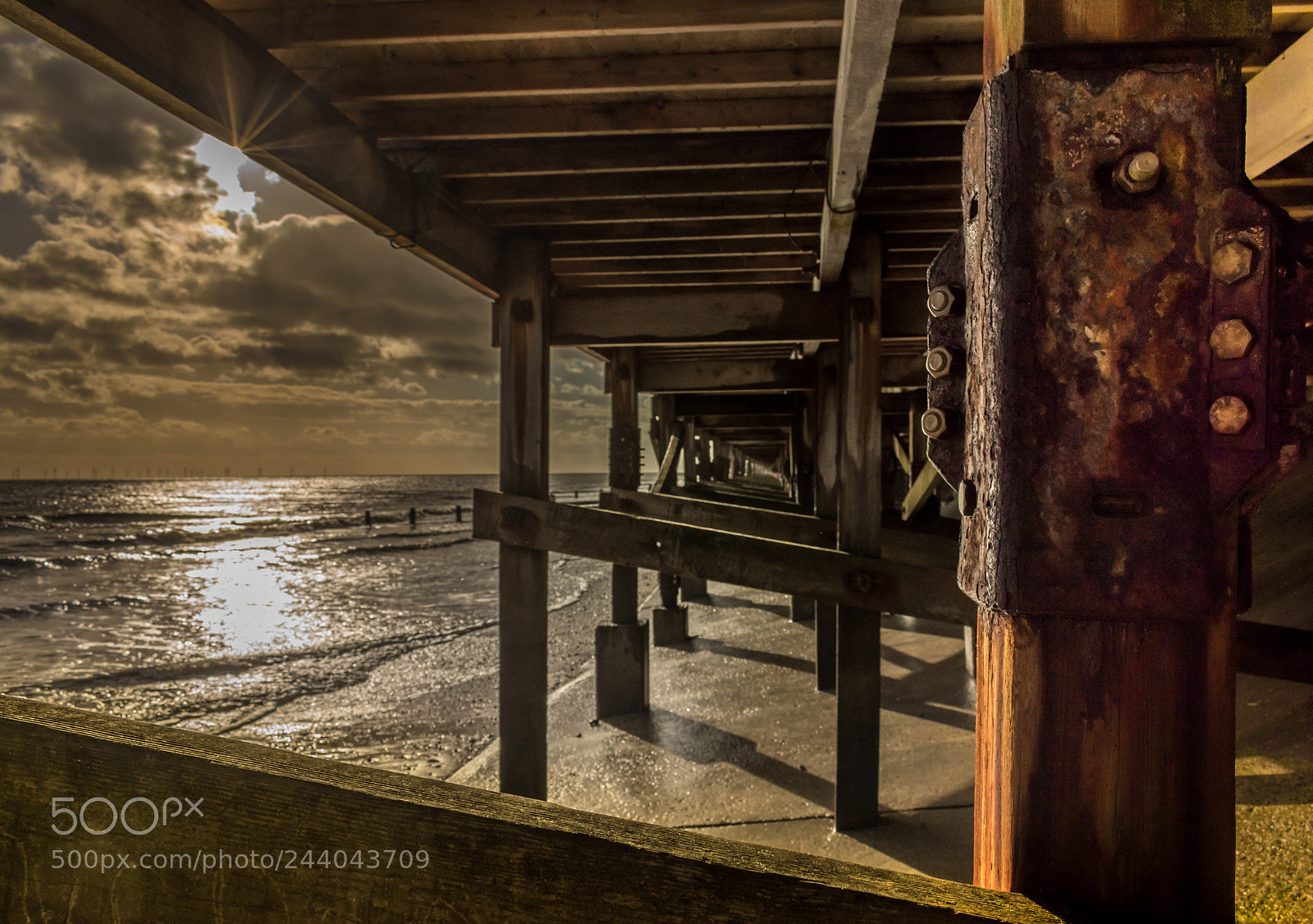 Nikon D5500 sample photo. Underneath the beach huts photography