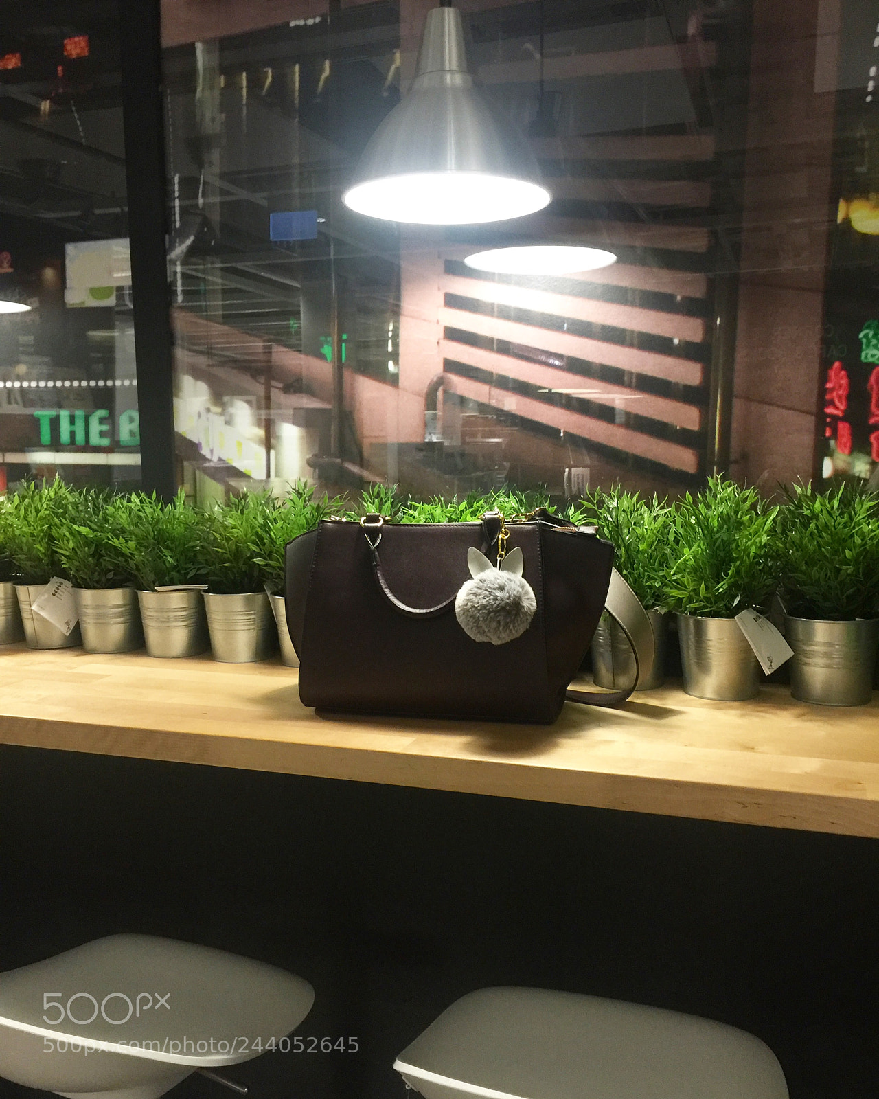 Apple iPhone 6 Plus sample photo. Bag in a spotlight photography