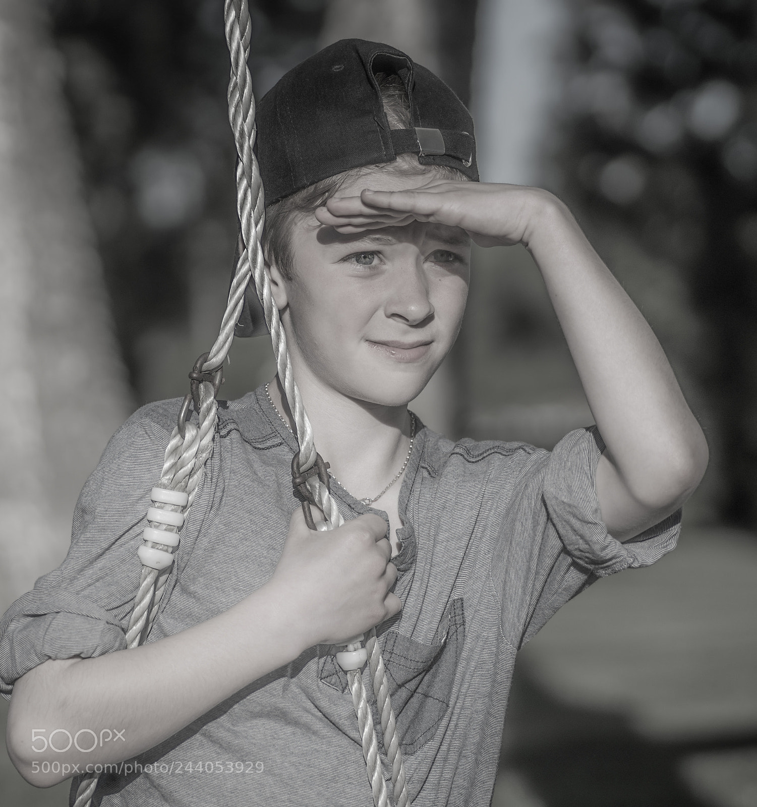 Sony a99 II sample photo. Boy shielding eyes from photography