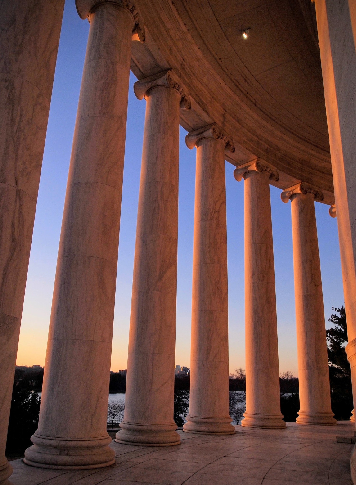 Olympus PEN E-P2 sample photo. Sunset through columns photography