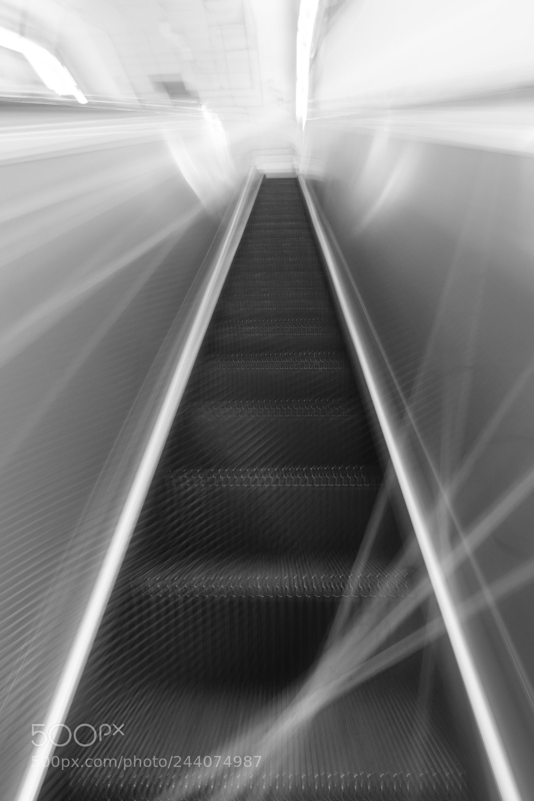 Fujifilm X-T20 sample photo. Moving stairs photography