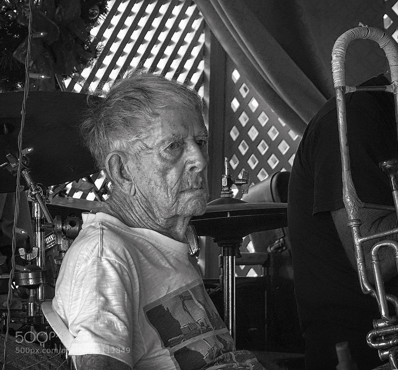 Sony Cyber-shot DSC-RX10 III sample photo. The trombone player.. photography