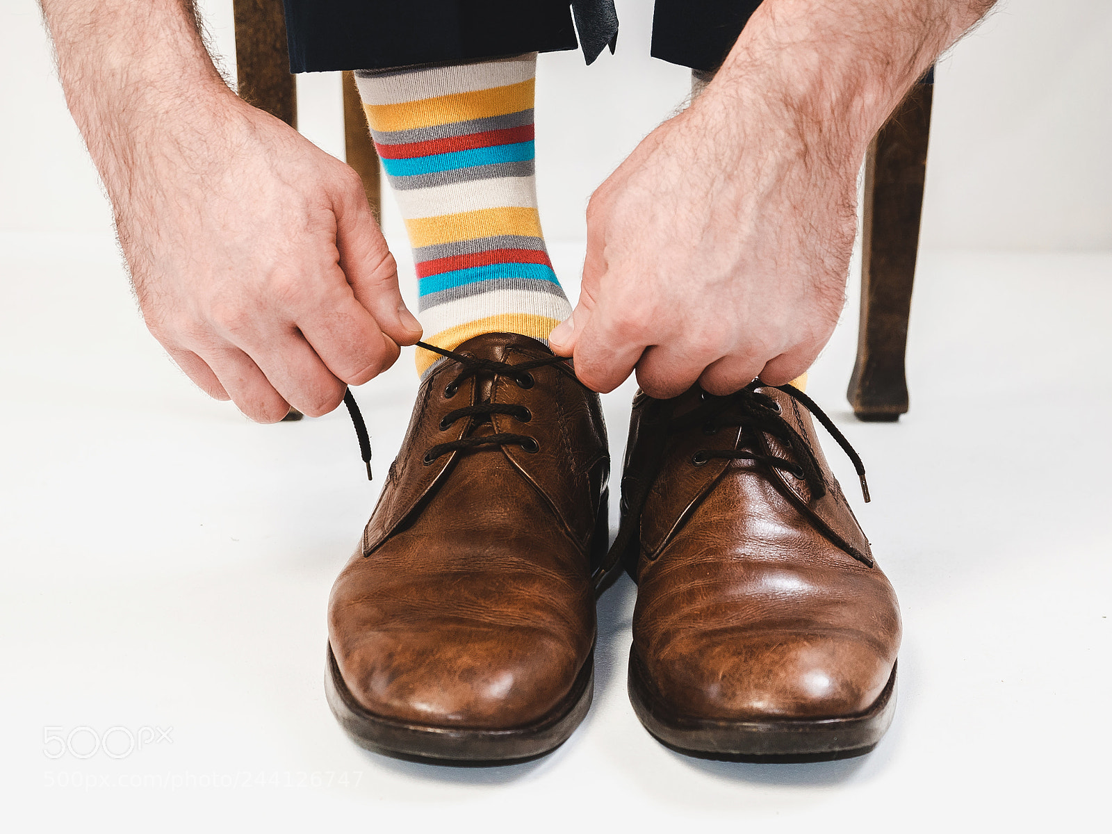Olympus OM-D E-M5 II sample photo. Men's feet in stylish photography
