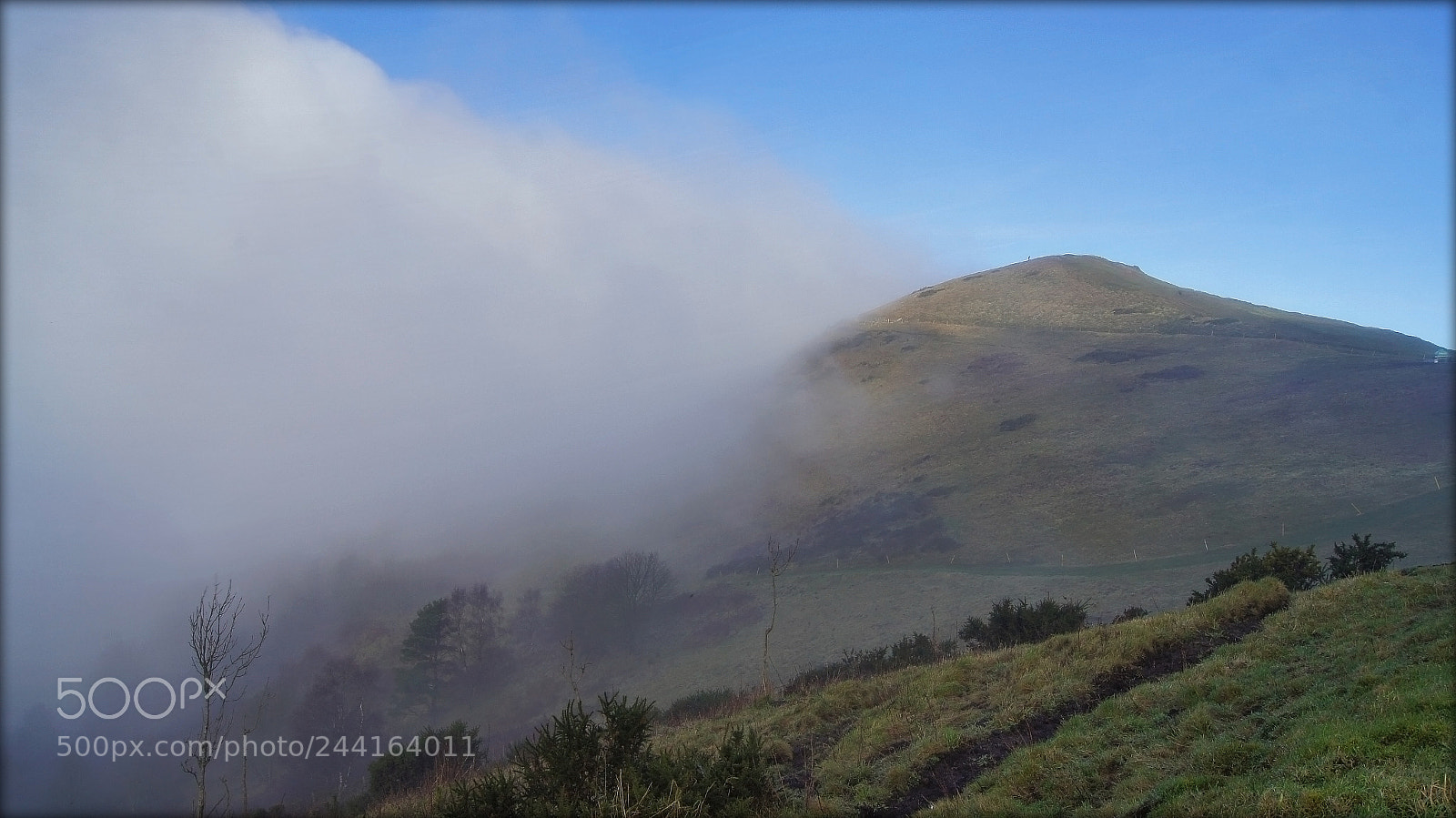 Sony SLT-A55 (SLT-A55V) sample photo. Clouds engulfing hills photography