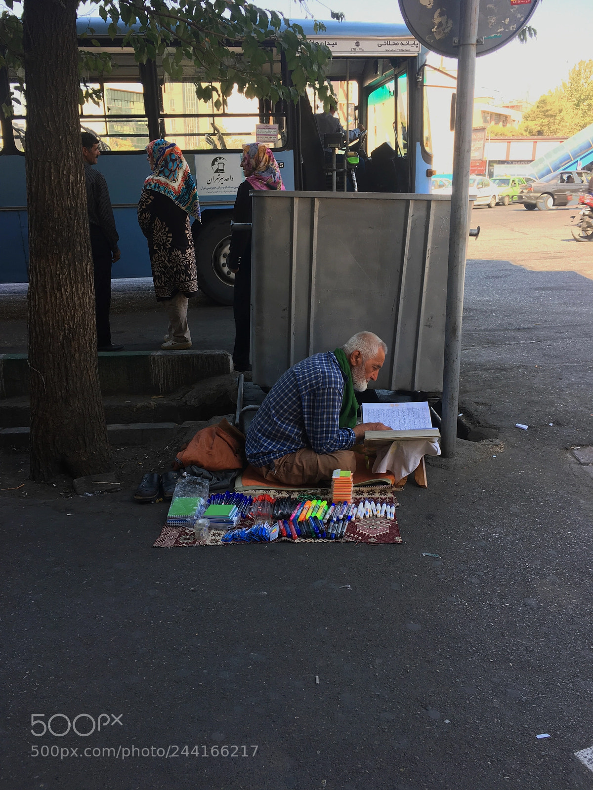 Apple iPhone 6s sample photo. He read the quran photography