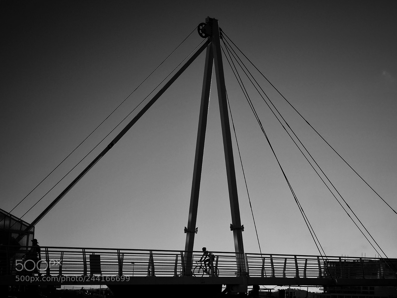 Panasonic Lumix DMC-GF7 sample photo. Riding over a bridge photography
