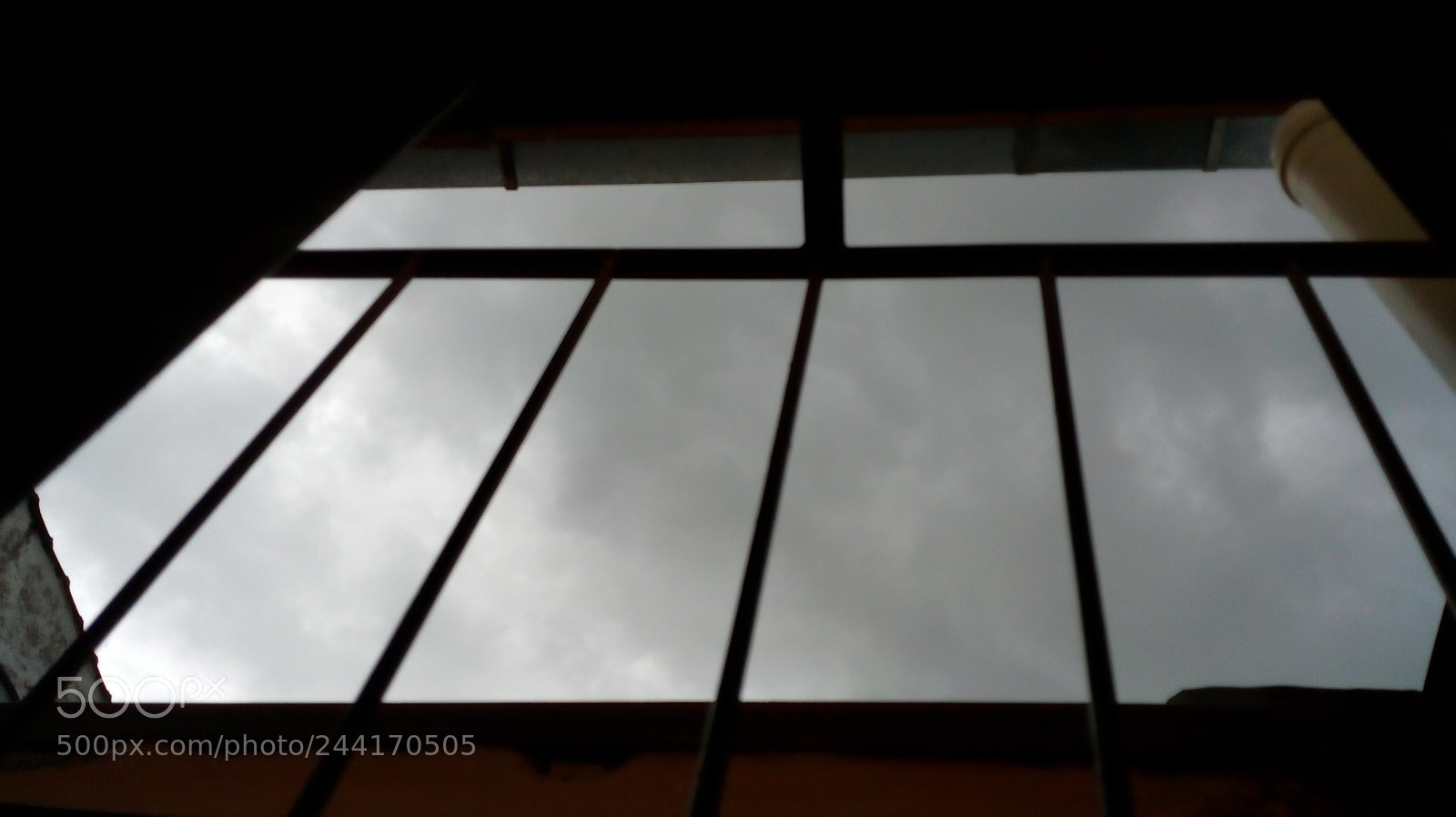 Motorola Moto E (4) Plus sample photo. Caged sky photography