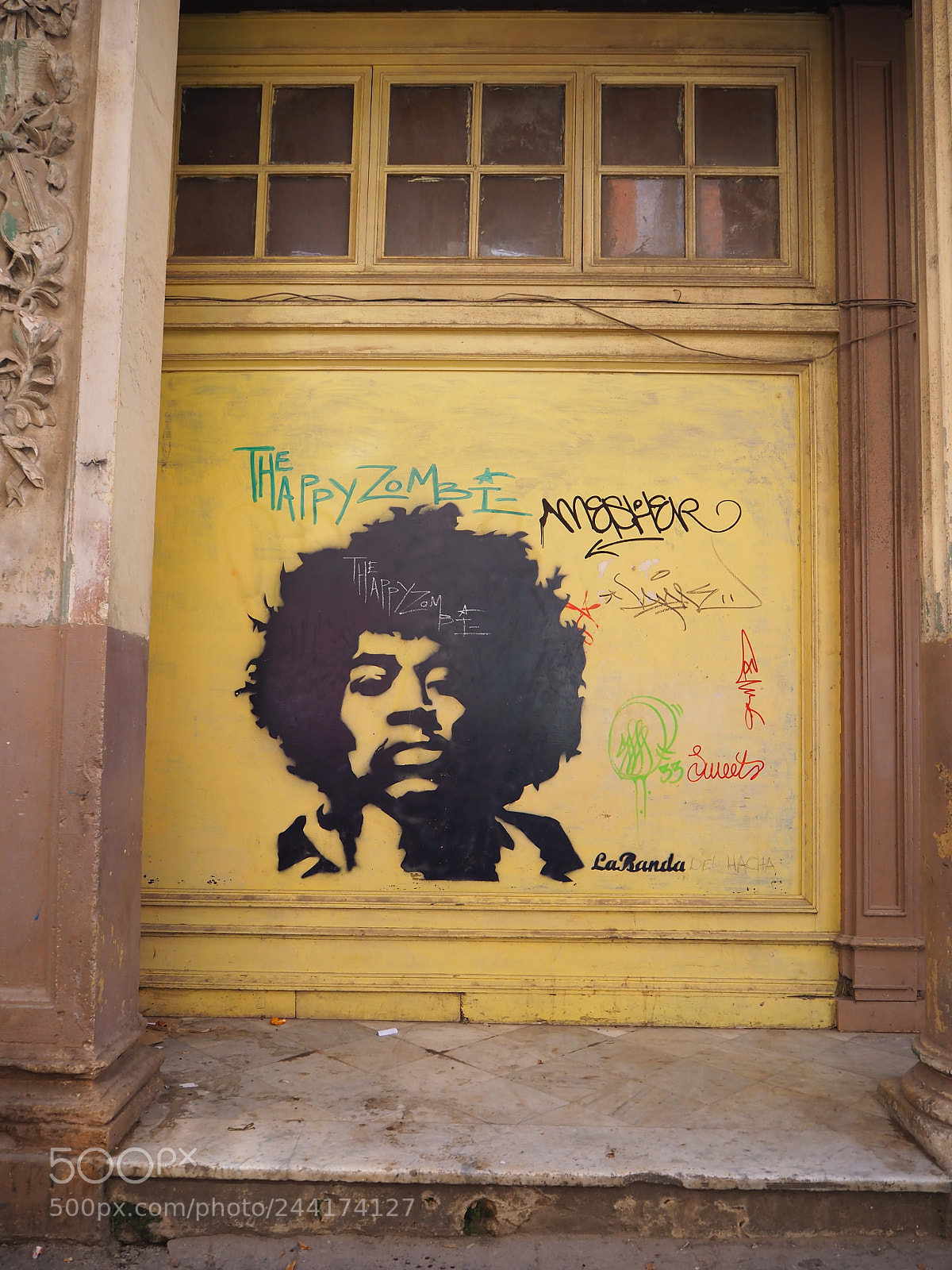 Olympus OM-D E-M10 II sample photo. The happy zombie graffiti photography