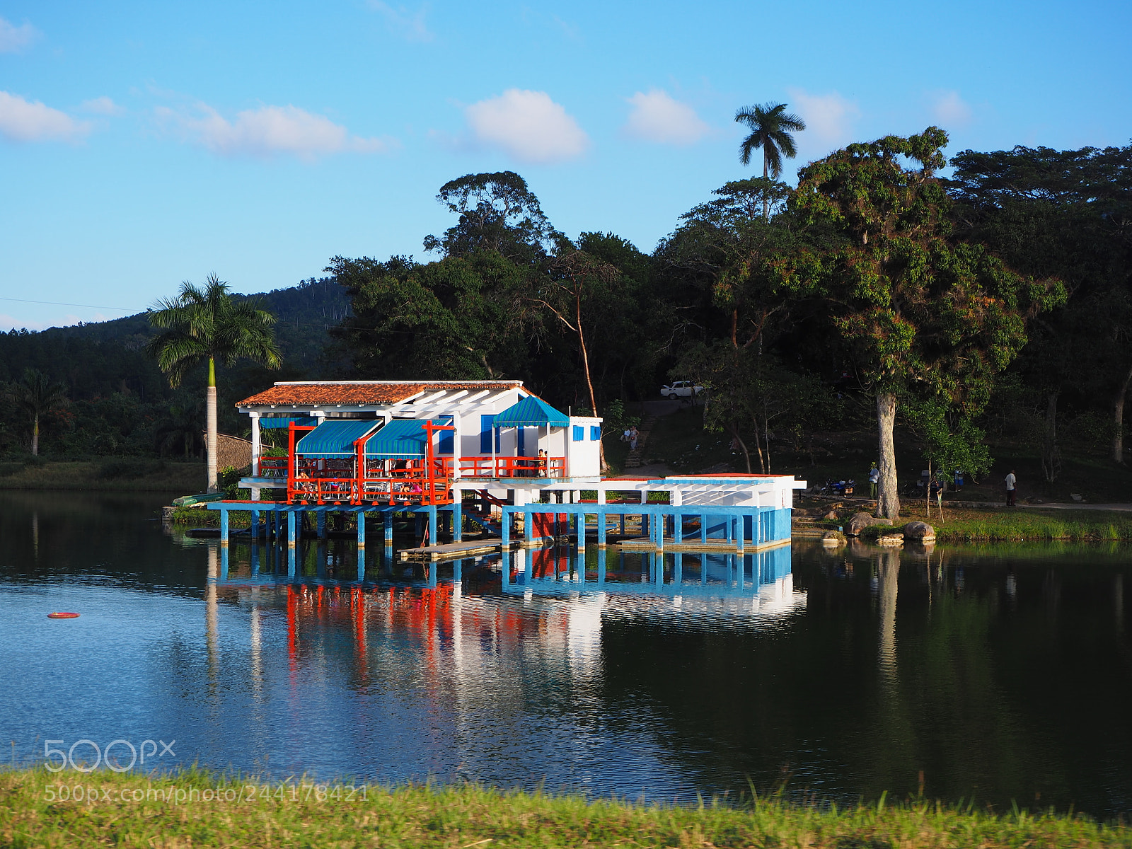 Olympus OM-D E-M10 II sample photo. Boathouse on the lake photography