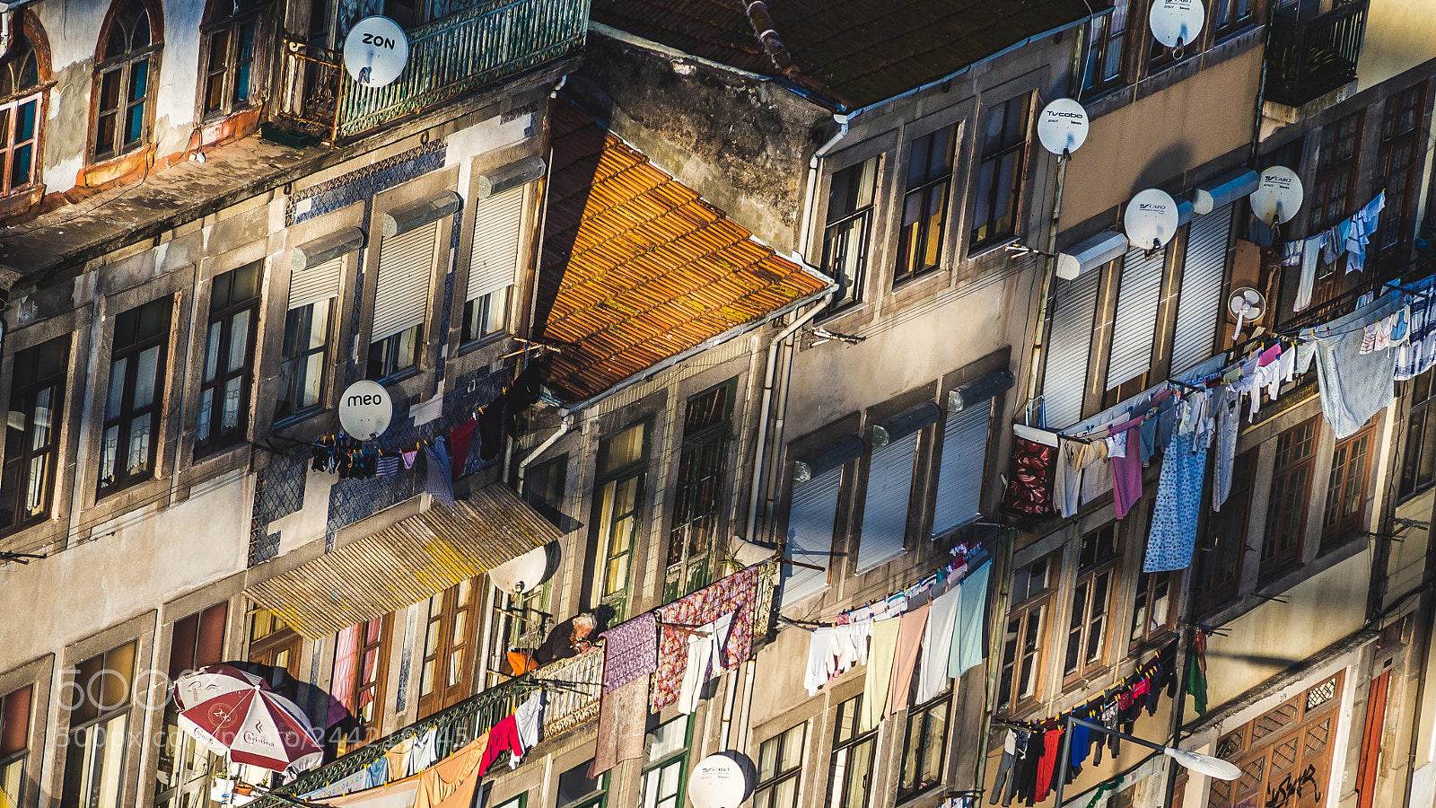 Olympus OM-D E-M10 sample photo. Windows and balconies, old photography