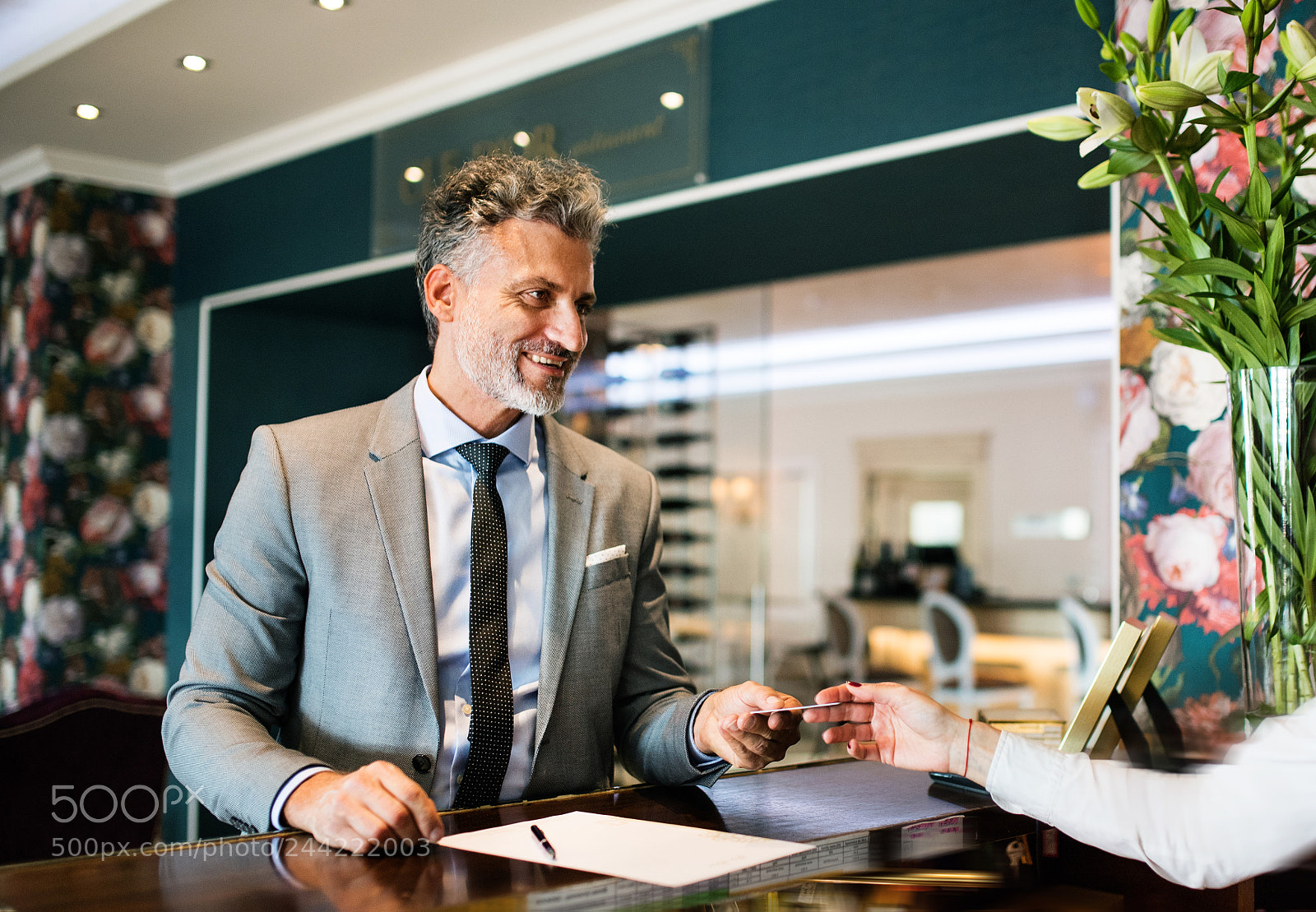 Nikon D5 sample photo. Mature businessman at hotel photography
