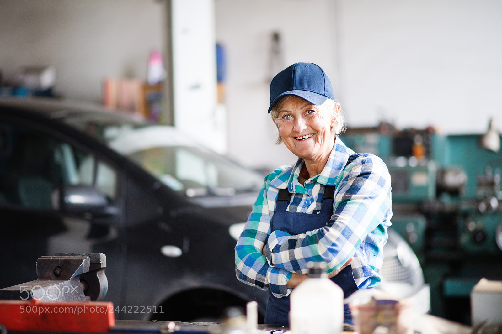 Nikon D5 sample photo. Senior female mechanic repairing photography