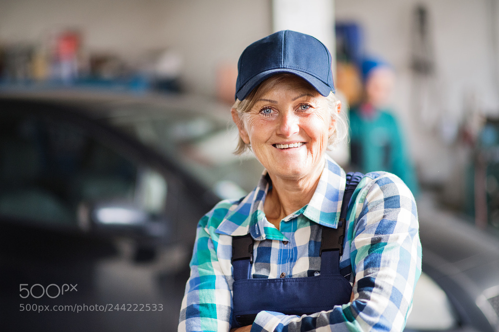 Nikon D5 sample photo. Senior female mechanic repairing photography