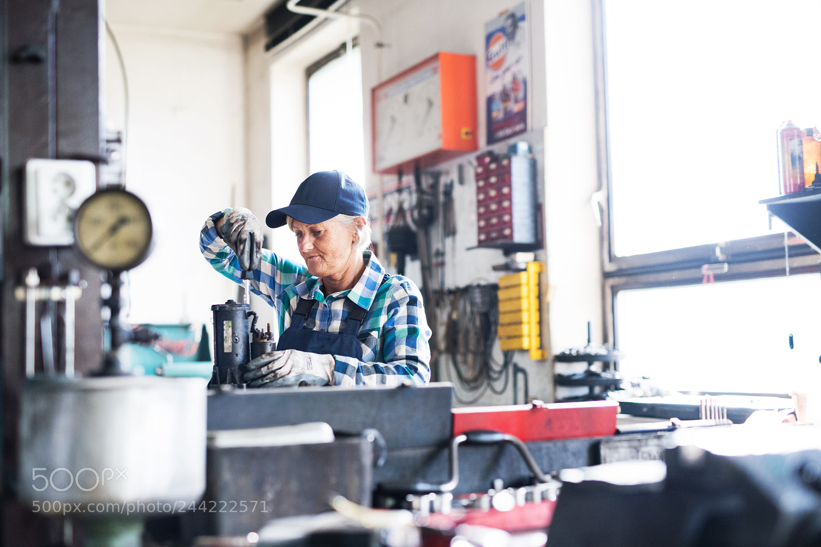Nikon D5 sample photo. Senior female mechanic repairing photography