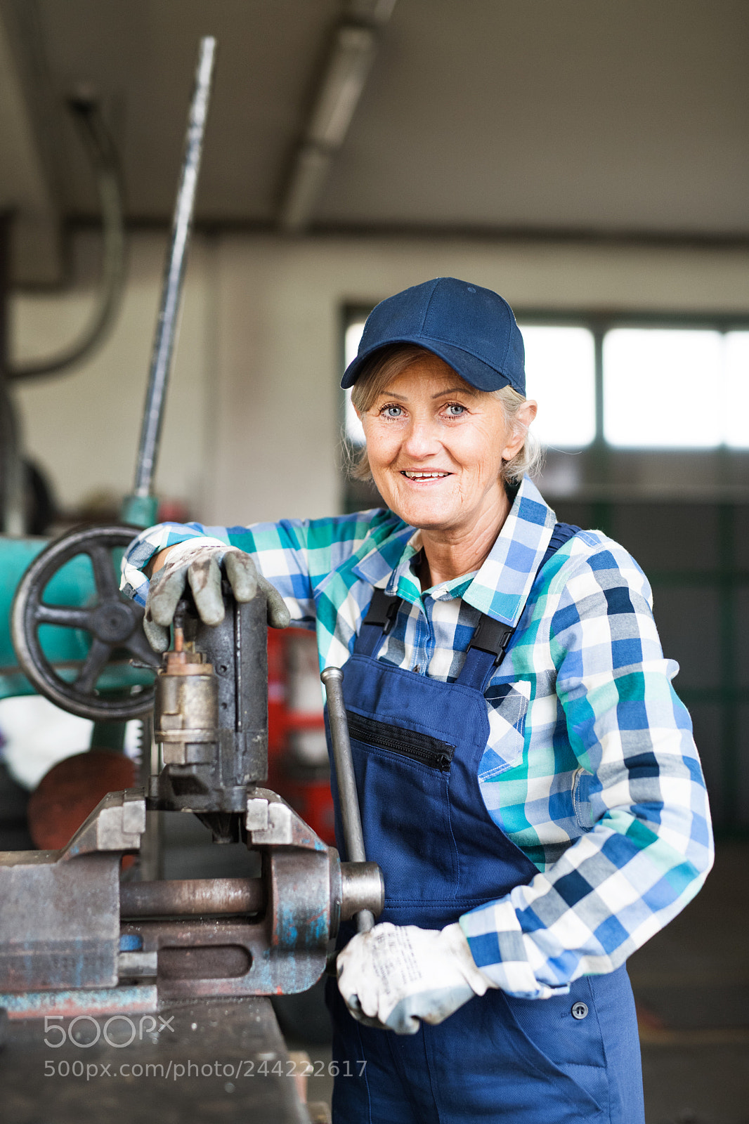Nikon D5 sample photo. Senior female mechanic repairing photography