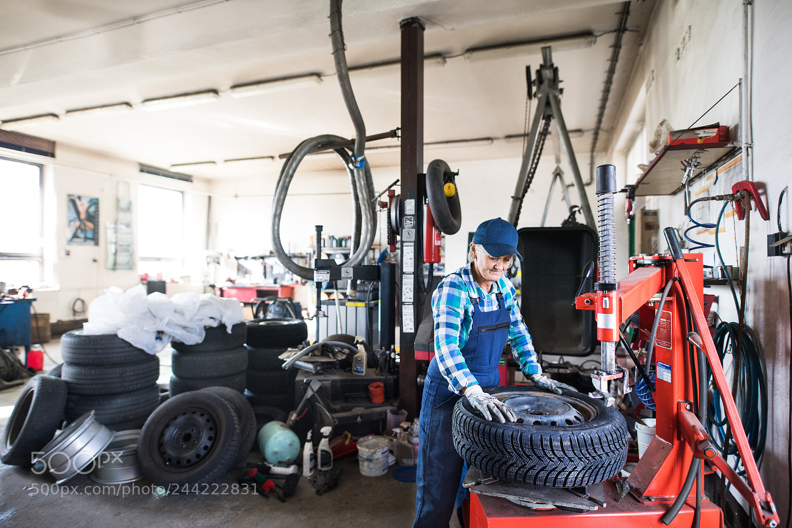 Nikon D5 sample photo. Senior female mechanic repairing photography