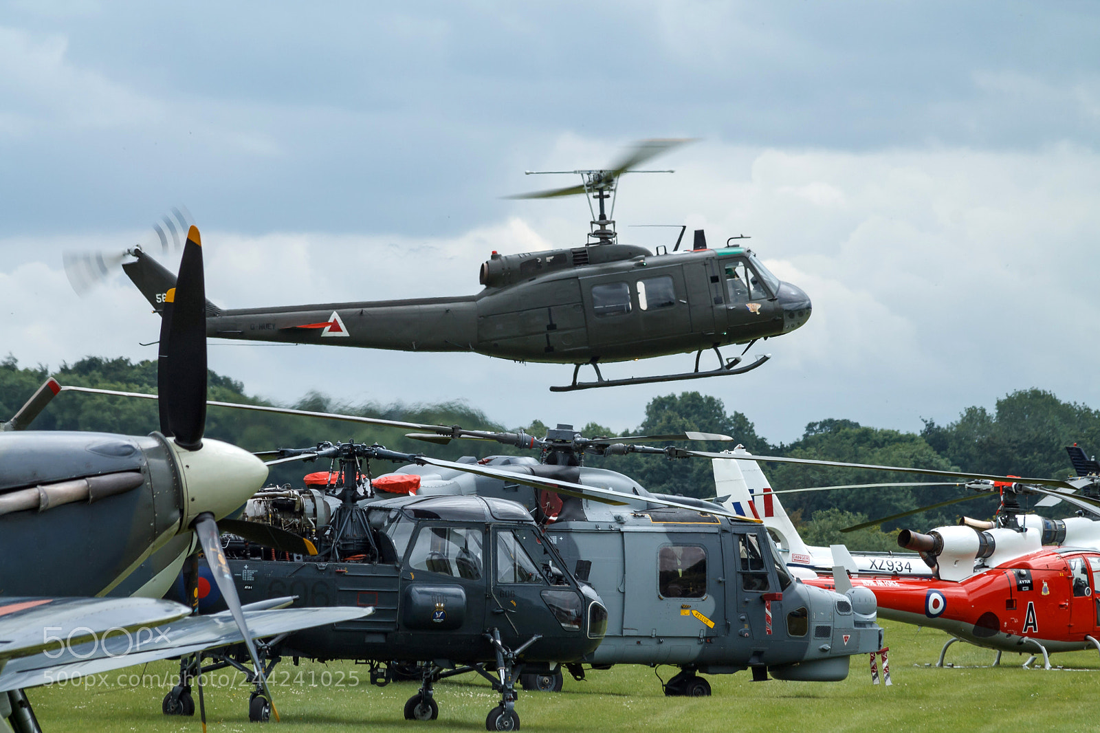Canon EOS 1100D (EOS Rebel T3 / EOS Kiss X50) sample photo. Huey helicopter hover above photography
