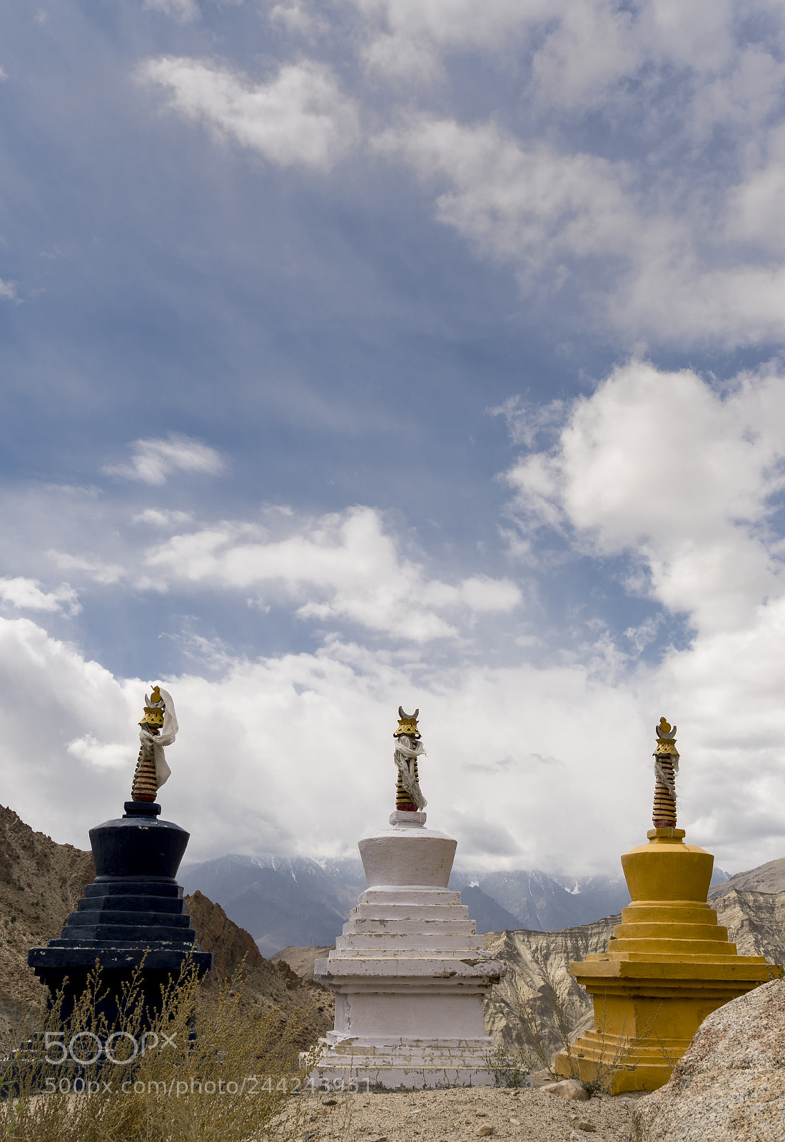 Sony a7R II sample photo. Three coloured stupas in photography