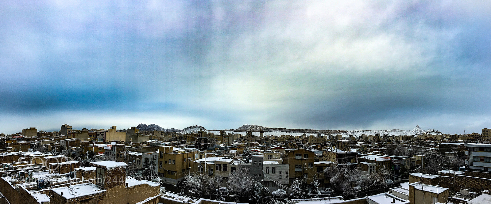 Apple iPhone 6s Plus sample photo. Snowy sky photography
