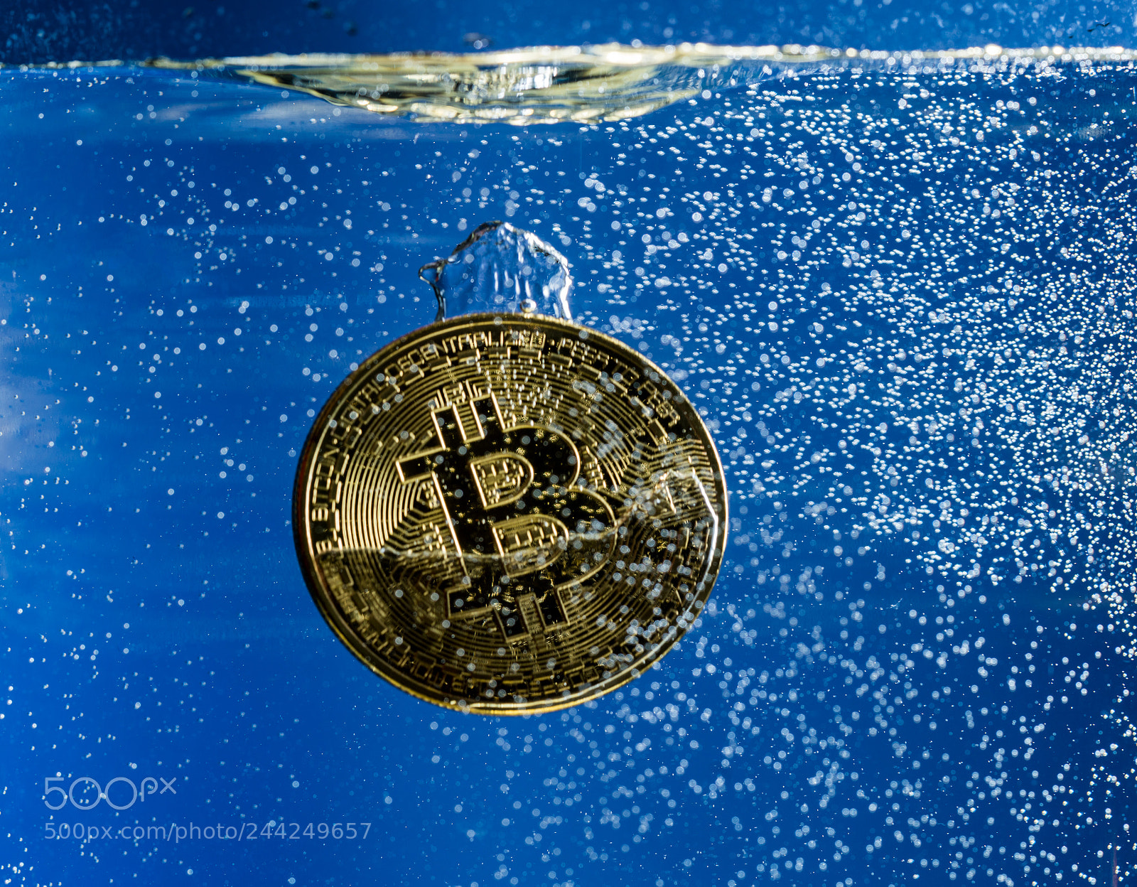 Sony a7R II sample photo. Bitcoin sinking through water photography